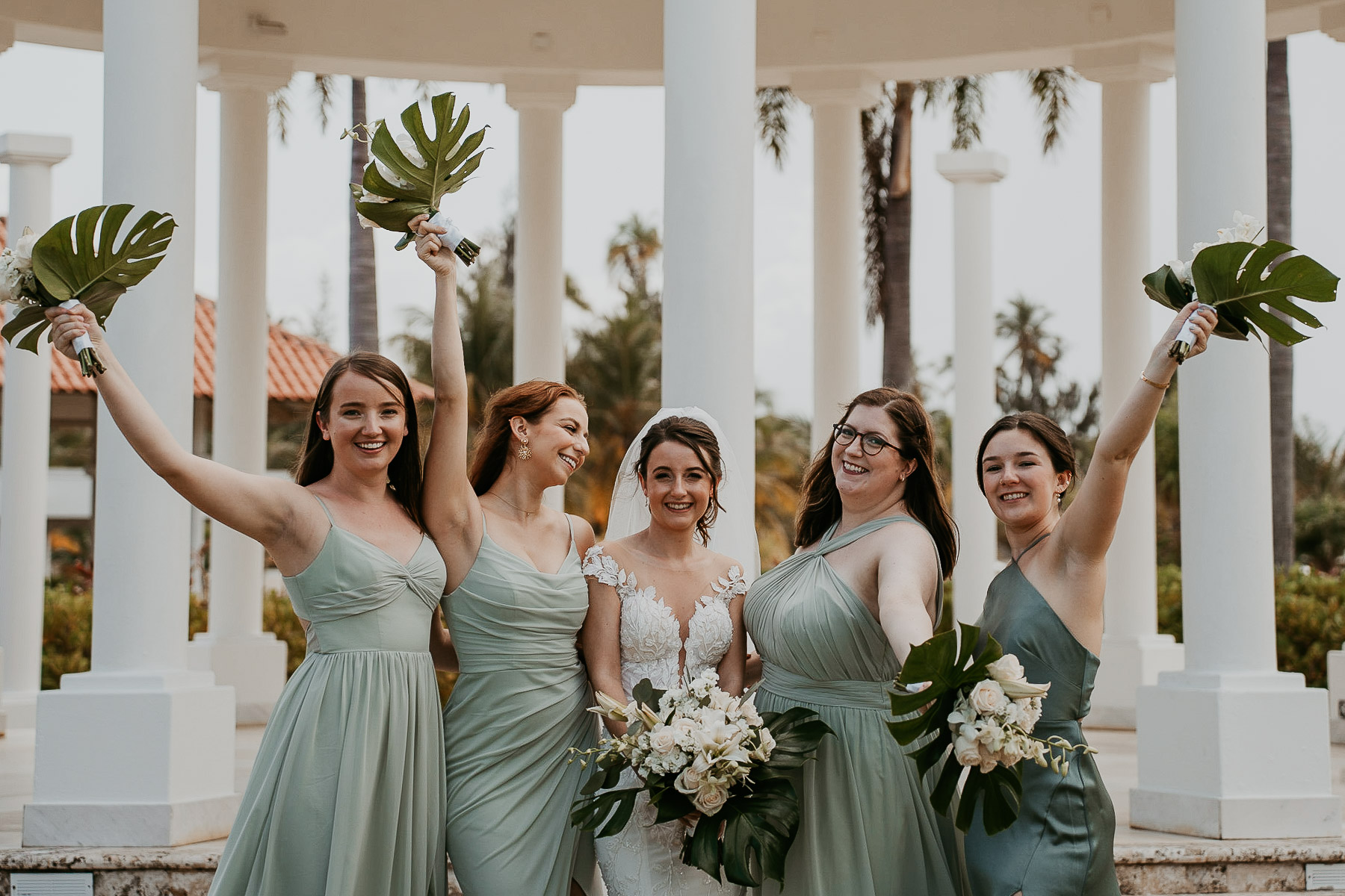 Bride squad celebrating at First kiss at Indoor ceremony at Hyatt Regency Grand Reserve Wedding..