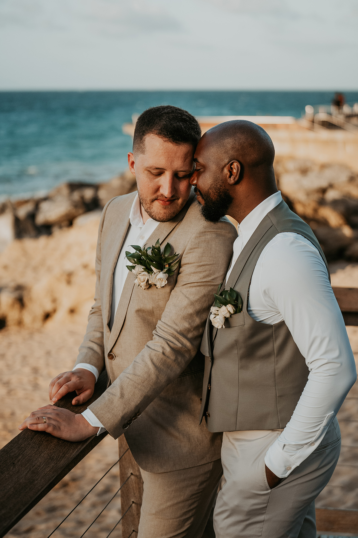 The newlyweds hold each other close during their wedding portraits.