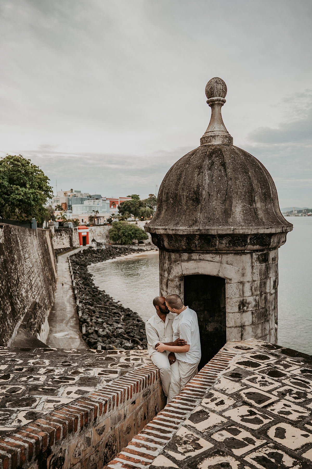 Wedding portraits of the newlyweds near Puerta de San Juan, the historic city gate.

