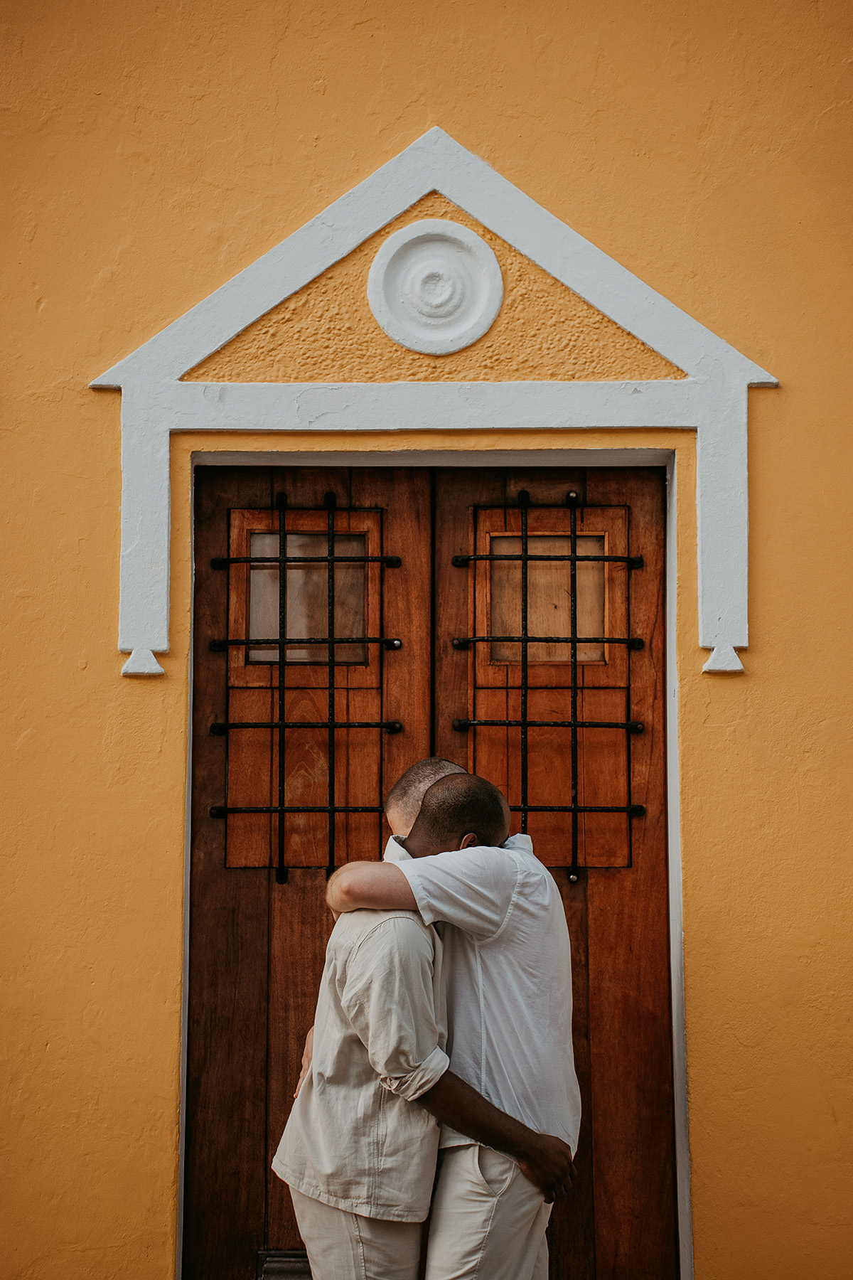 Couple session of gay couple along the historic streets of Old San Juan, Puerto Rico.