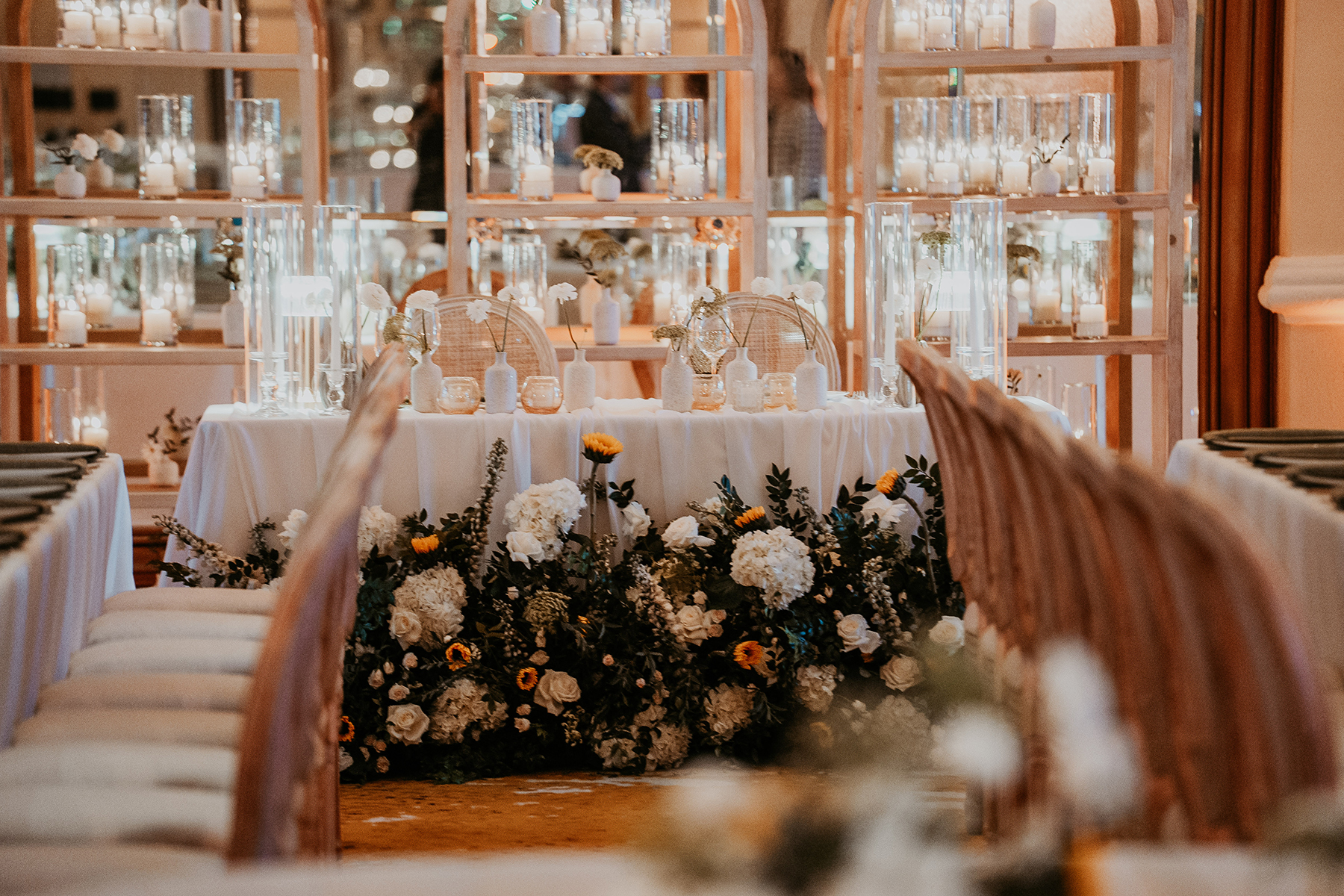 Wedding floral arrangements complementing the reception design at the Condado Vanderbilt.