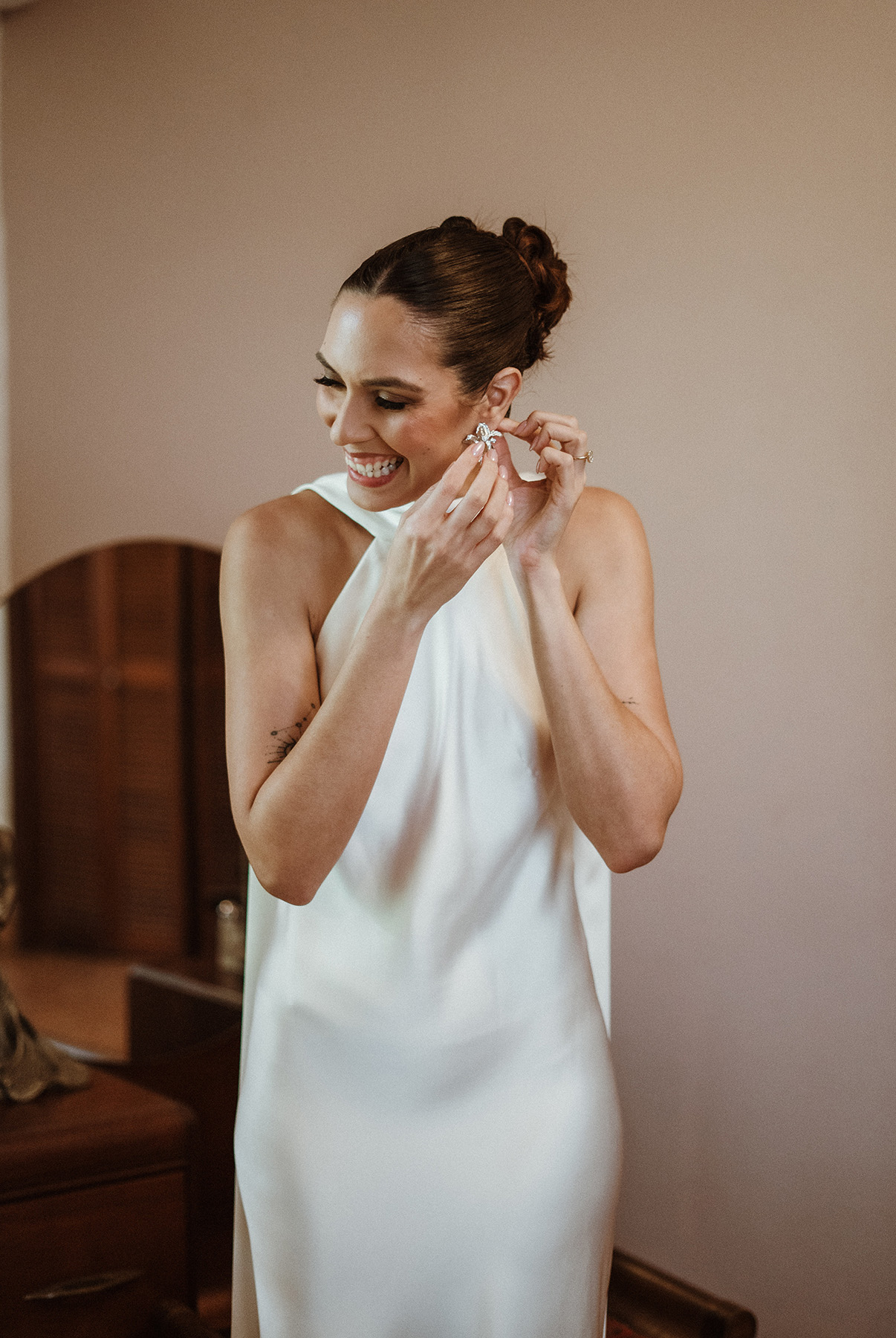 Bride smiling while getting ready for her intimate wedding in Puerto Rico