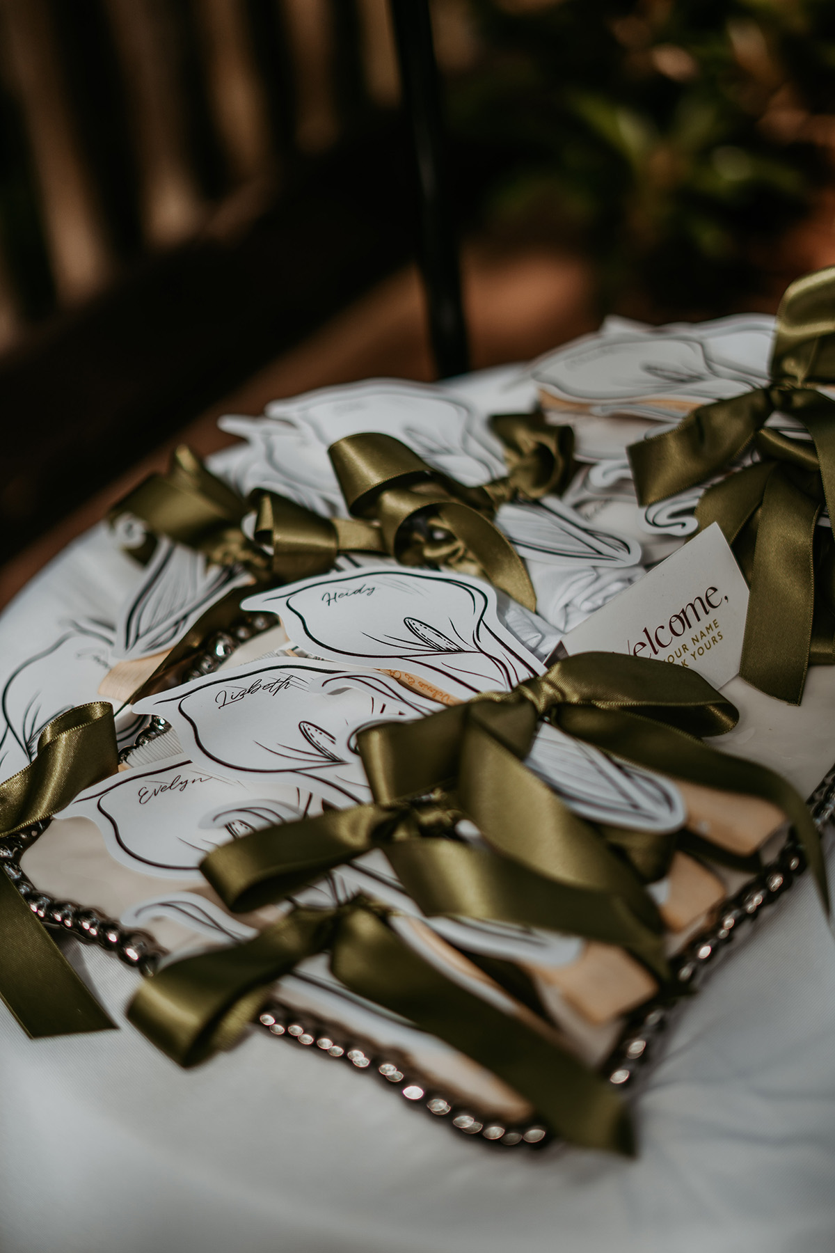 Table numbers and floral details at an intimate wedding reception
