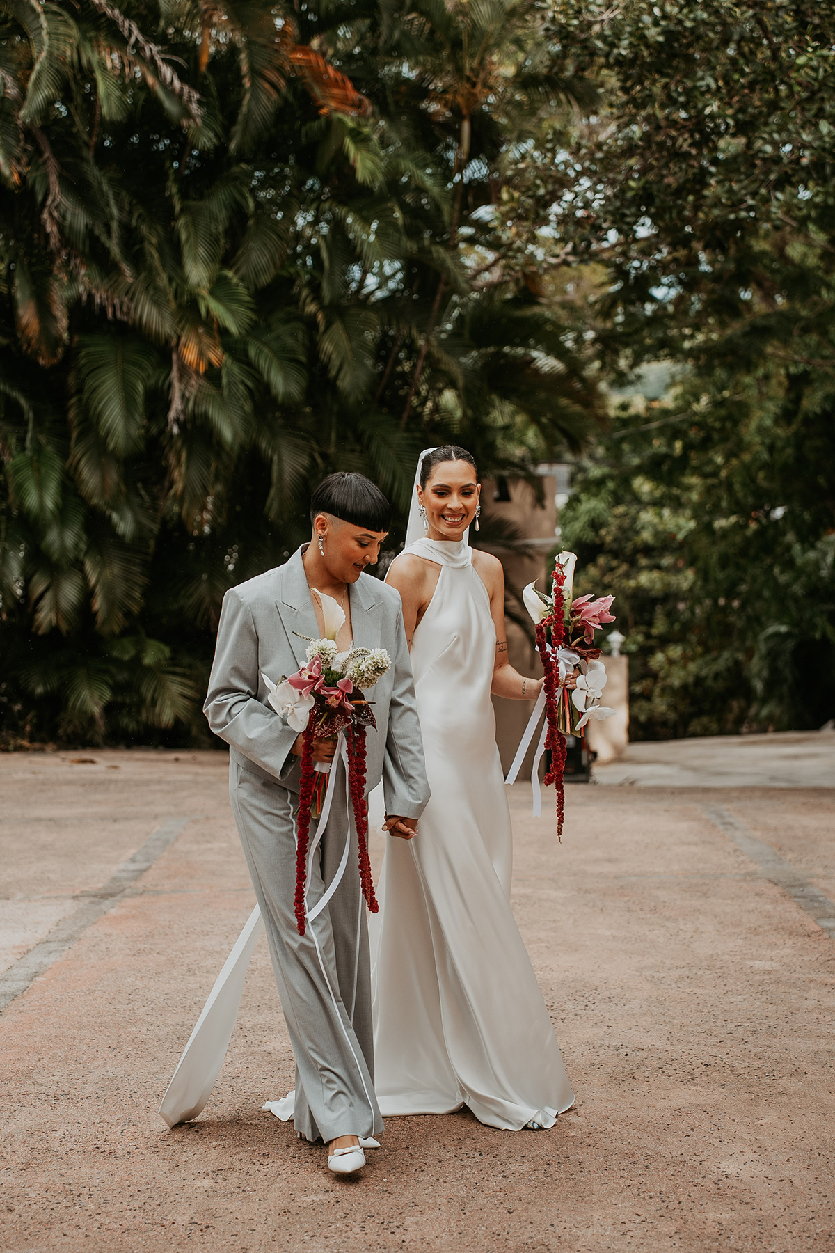 Newlywed couple walking hand in hand before their micro wedding ceremony