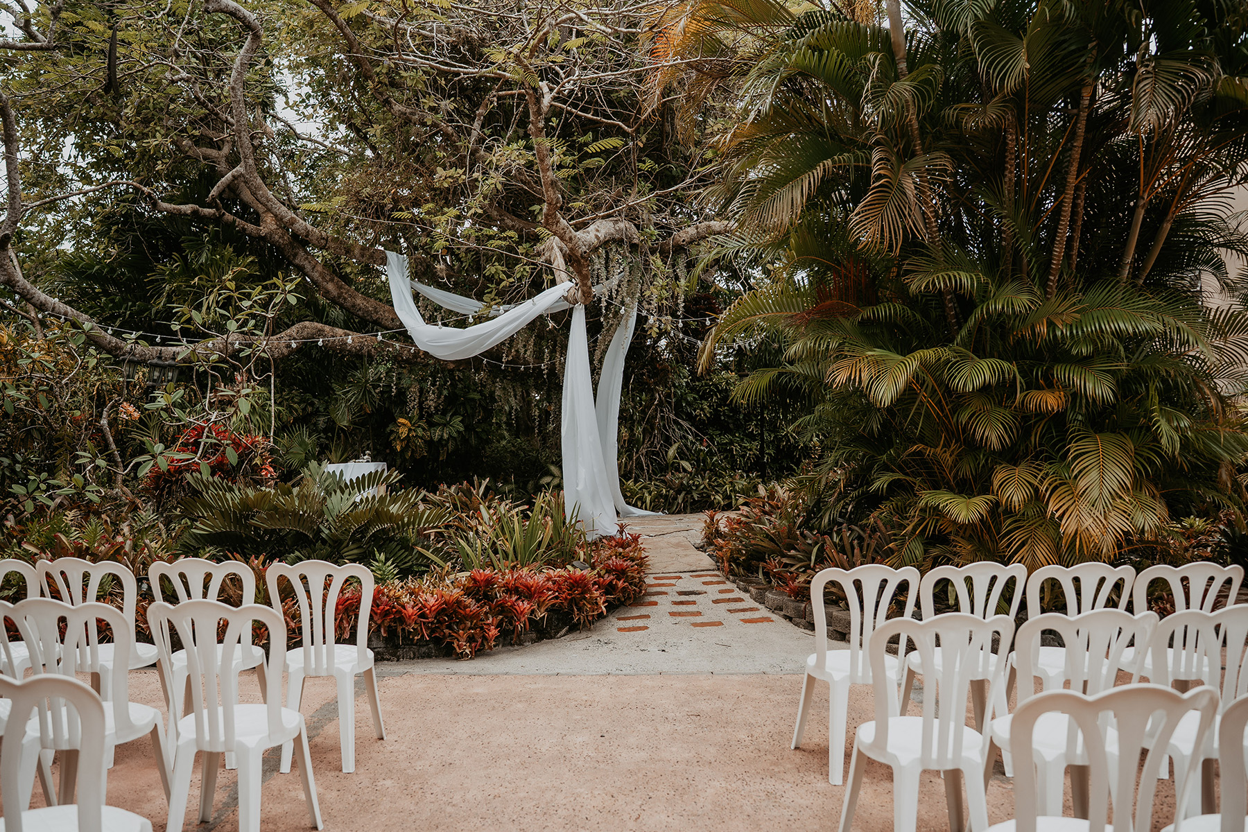 Wedding ceremony area decorated at Jardines del Castillo