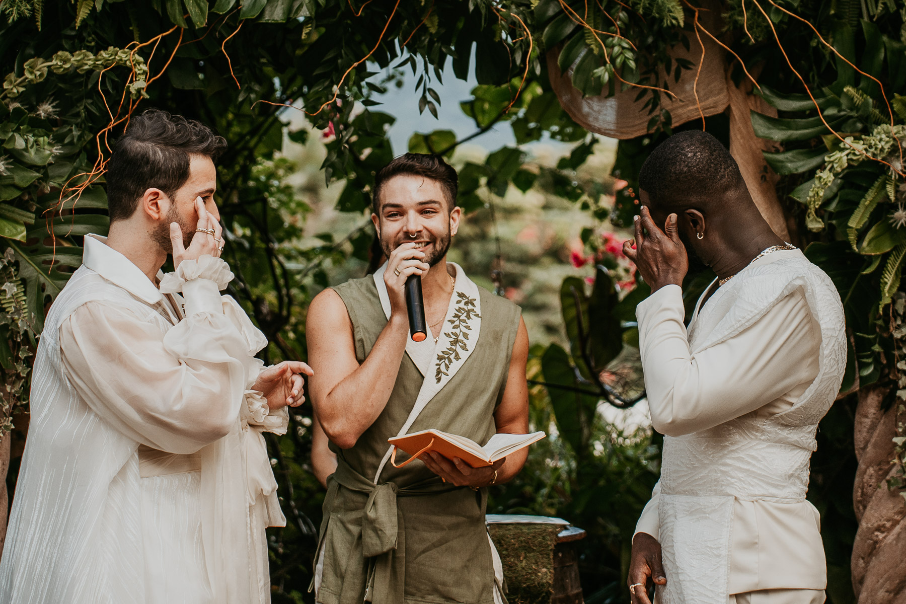 Heartfelt ceremony moments with the couple laughing and shedding tears of joy as they exchange vows surrounded by loved ones.