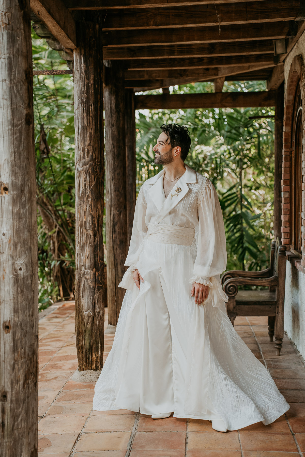 Couple in wedding attire standing in Front of their getting ready room at Hacienda Siesta Alegre.