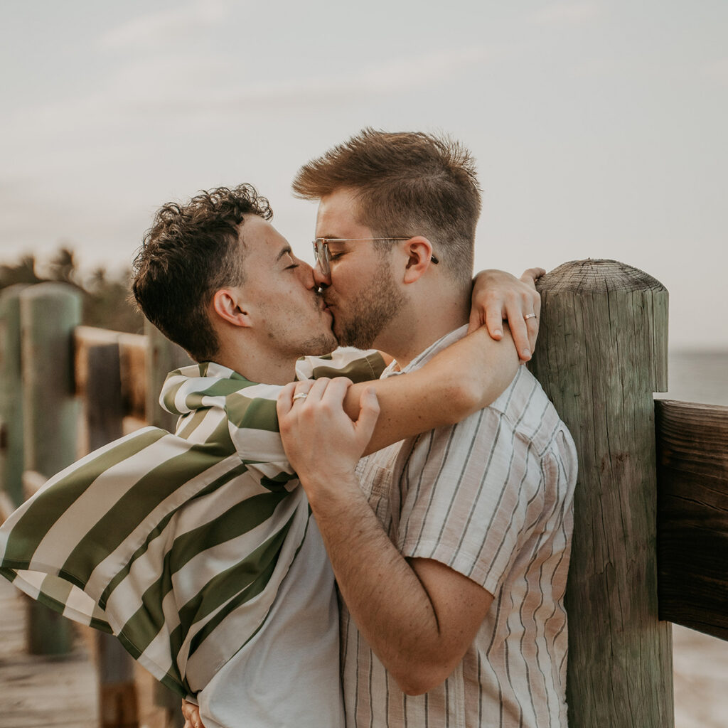 Gay couple beach wedding proposal