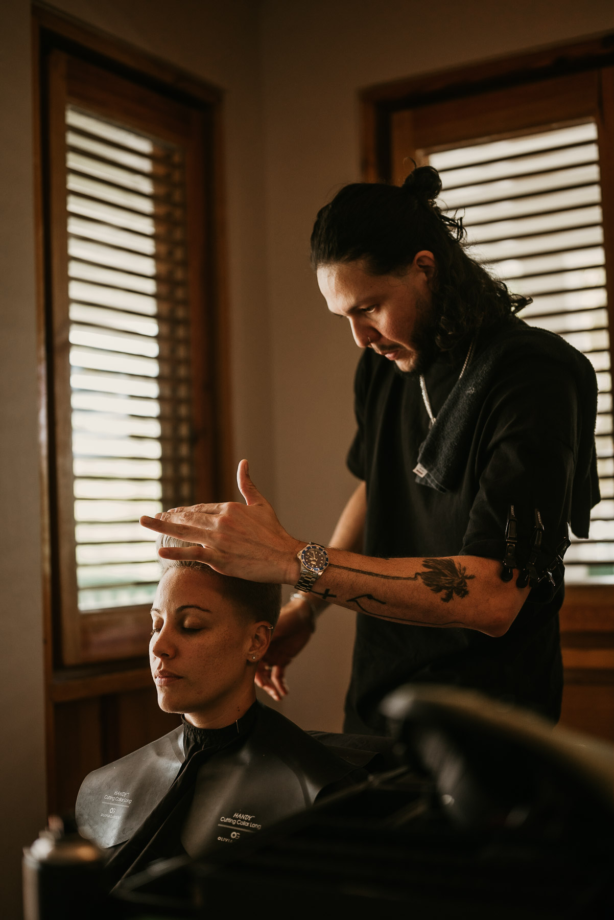 Bride getting hair cut before her wedding at Copamarina Beach Resort.