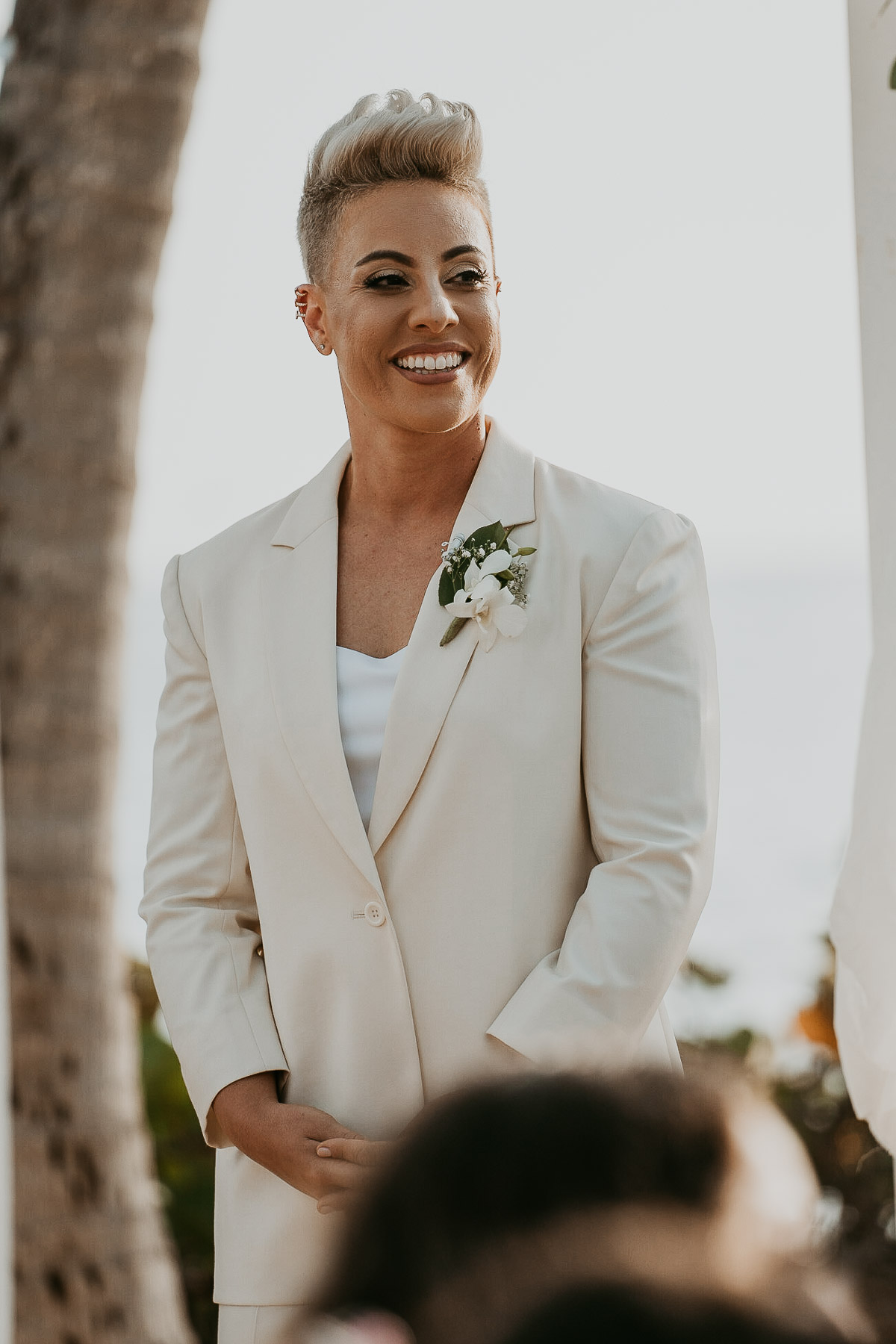 Happy bride waiting for bride during ceremony.