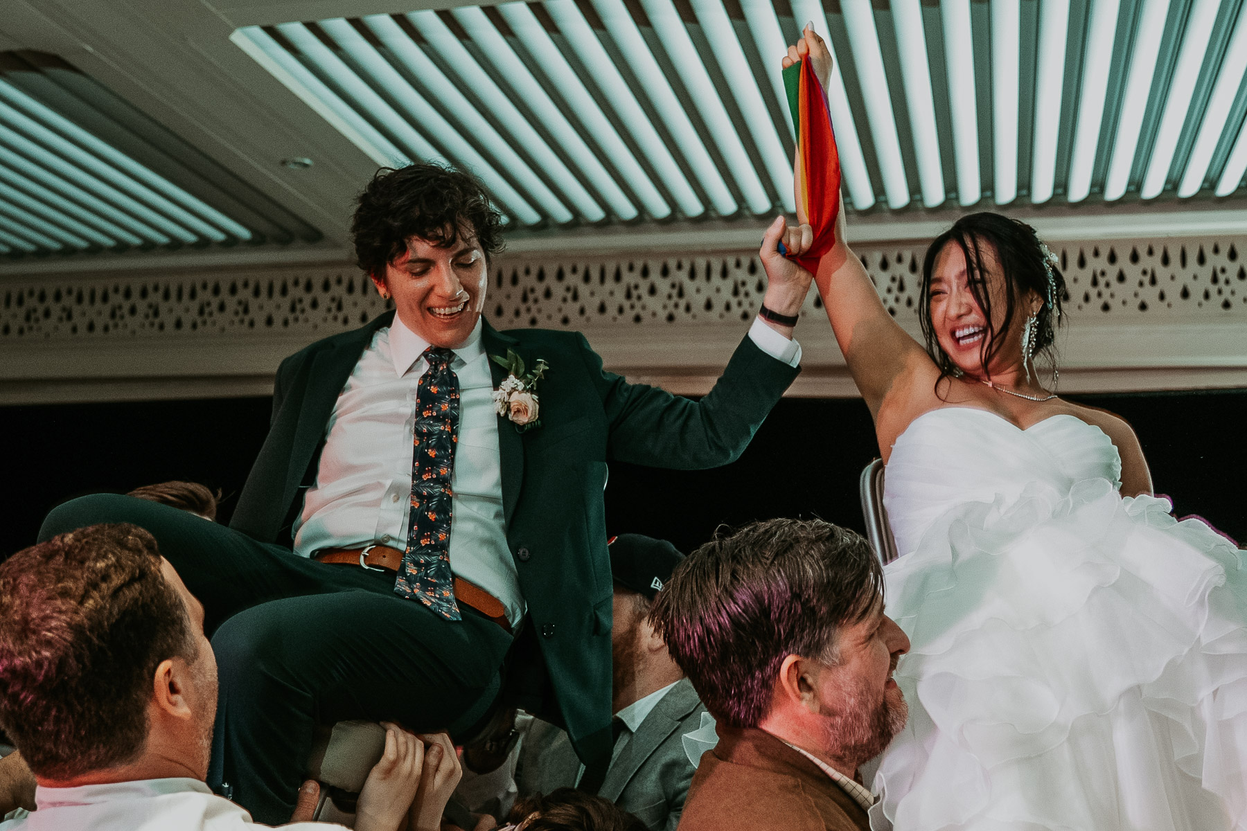 The final frames of the night showing the absolute fun on the dance floor after lesbian beach wedding.