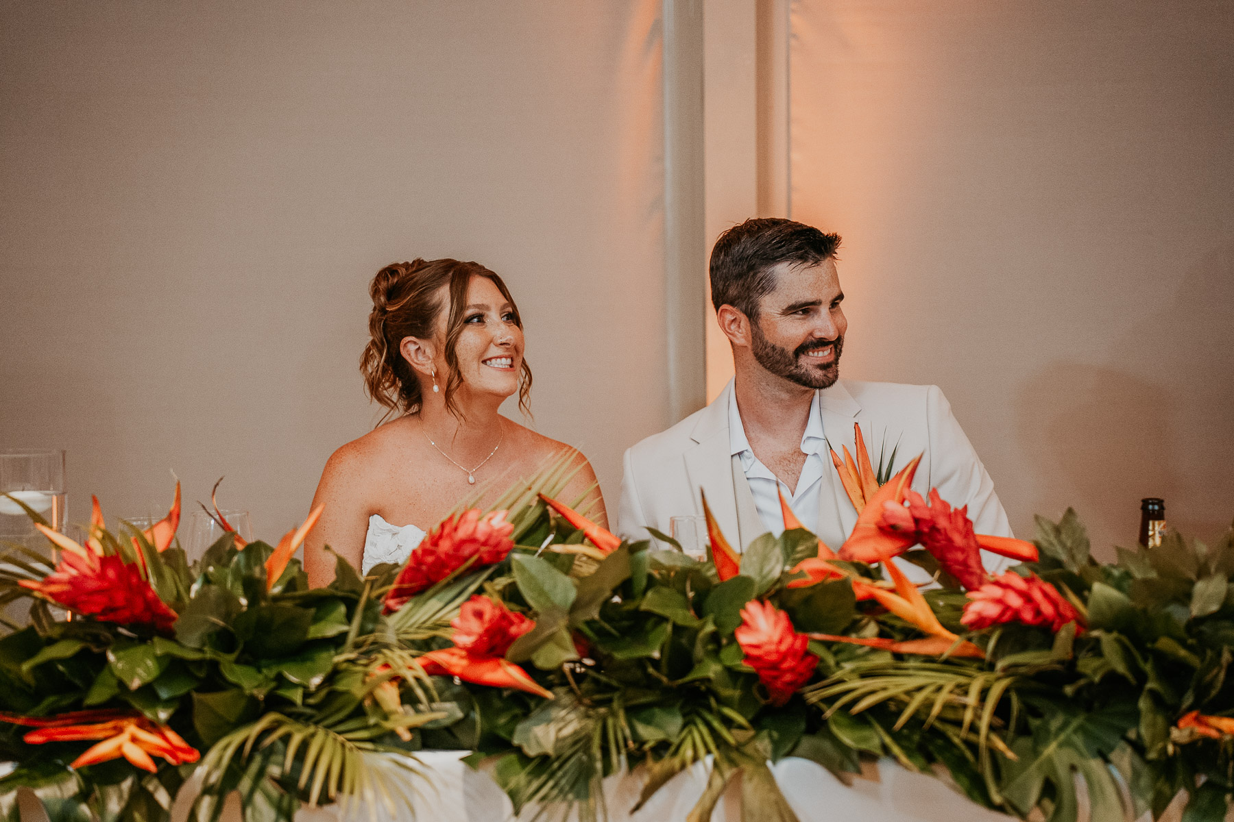 Candid shot of couple during wedding toasts at Marriot Isla Verde wedding venue