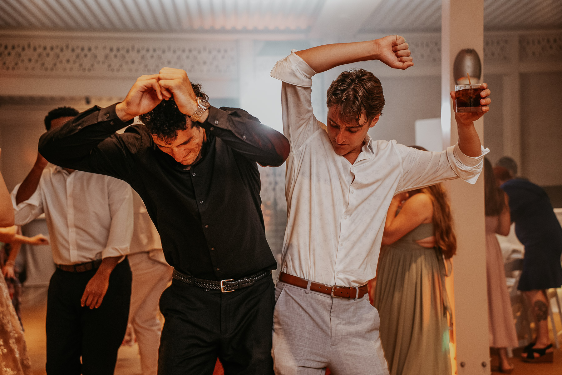 Wedding guests dancing during reception at Marriot Isla Verde wedding venue