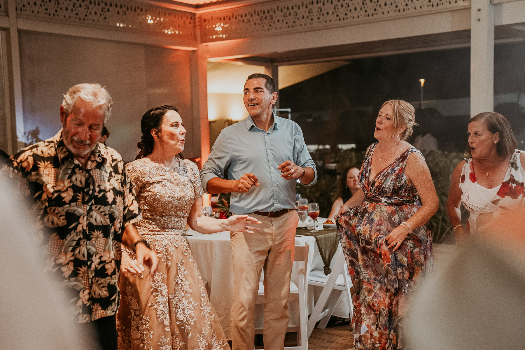 Wedding guests mingling during reception at Marriot Isla Verde wedding venue