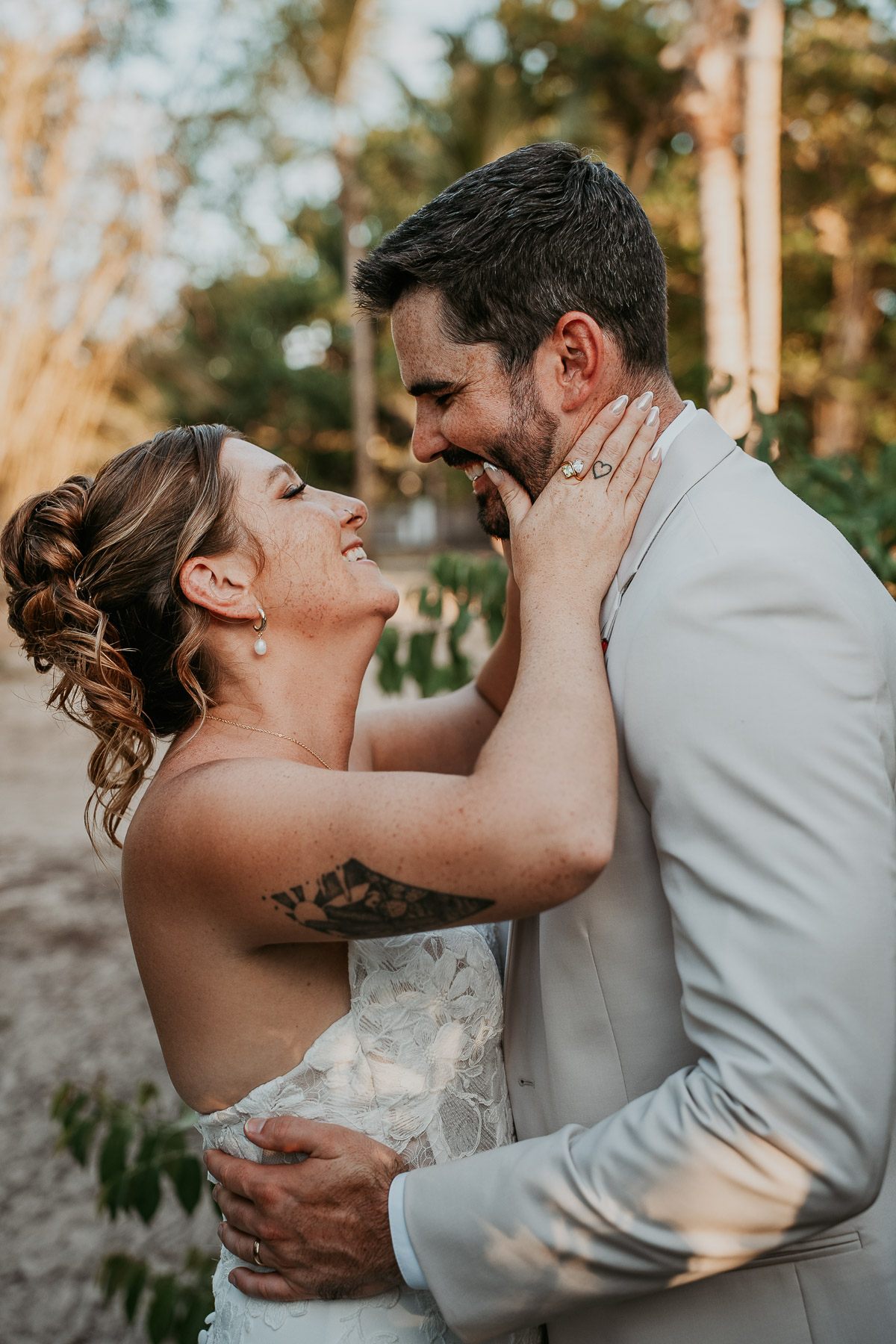 Romantic embrace between married couple after wedding ceremony