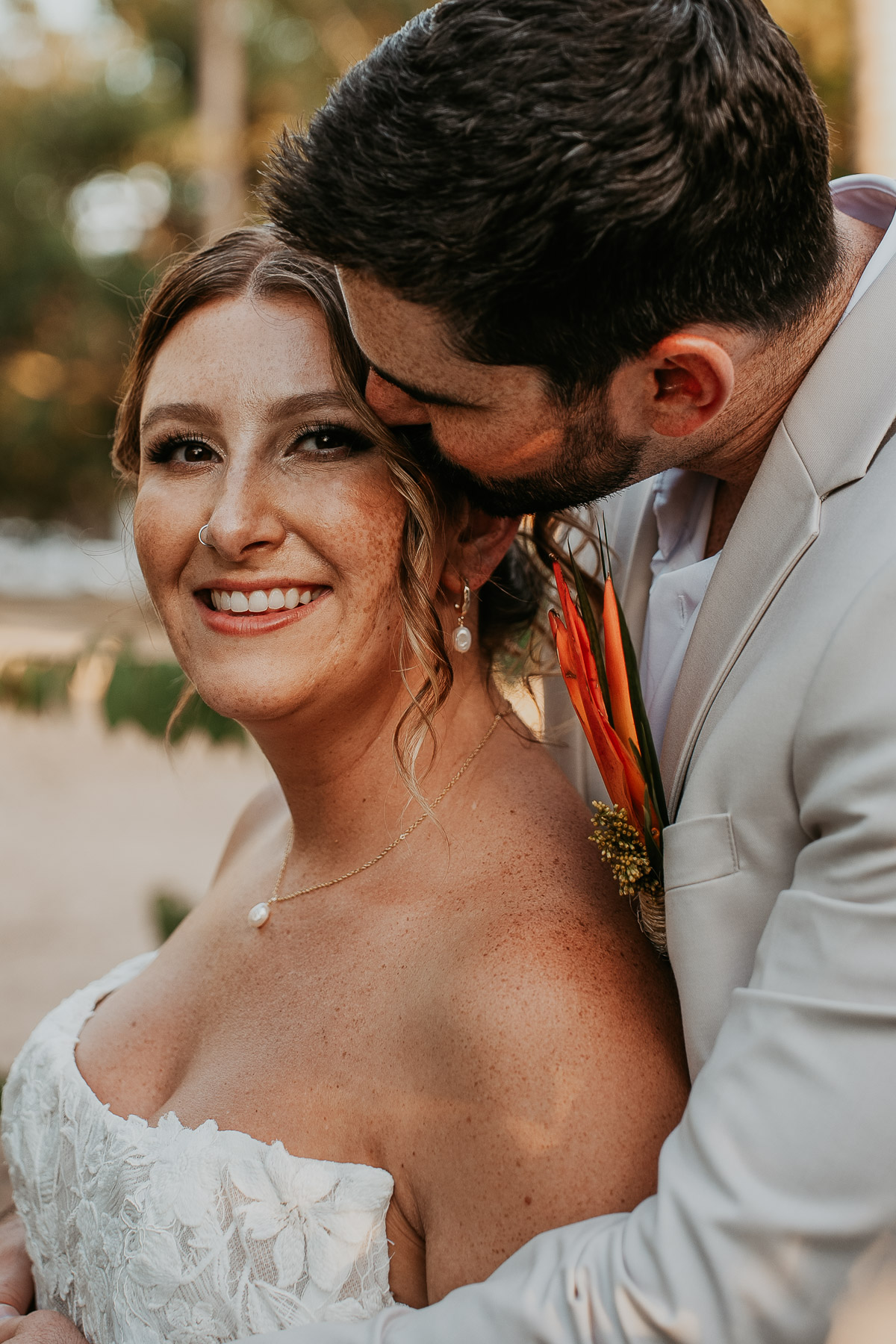 Intimate embrace between newlywed couple