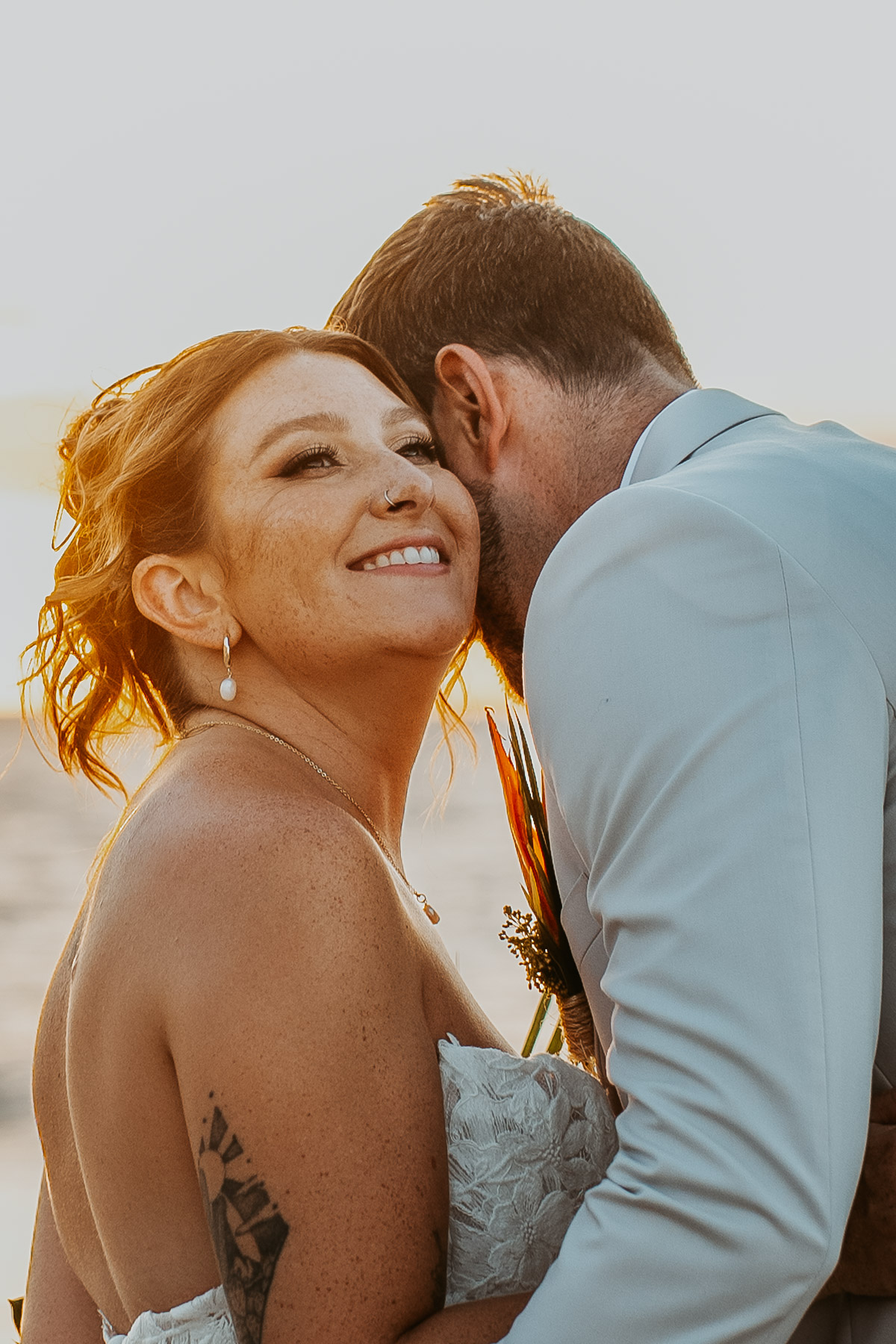 Close-up portrait of newlywed during golden hour