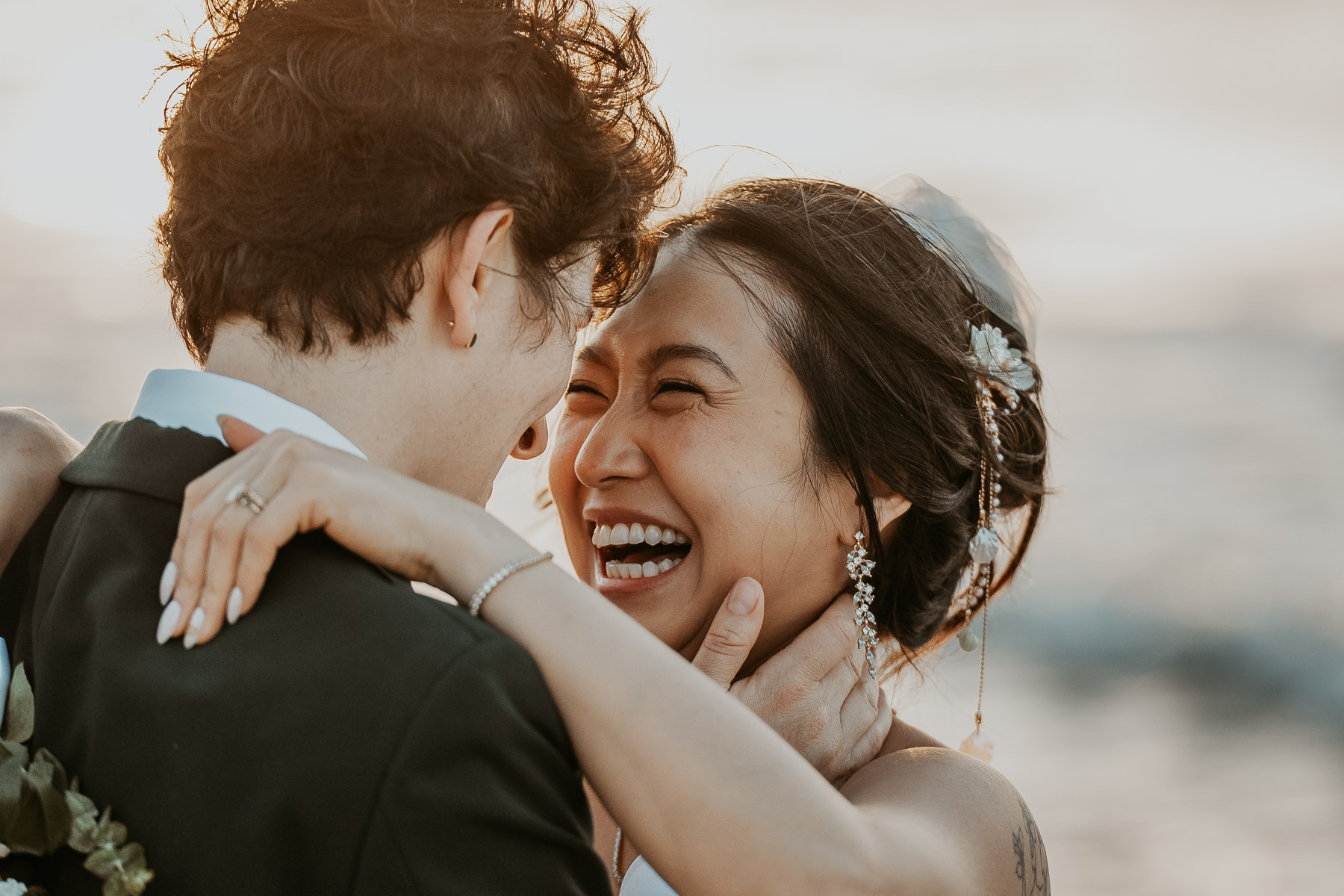 An intimate close up portrait of the couple looking into each other's eyes.