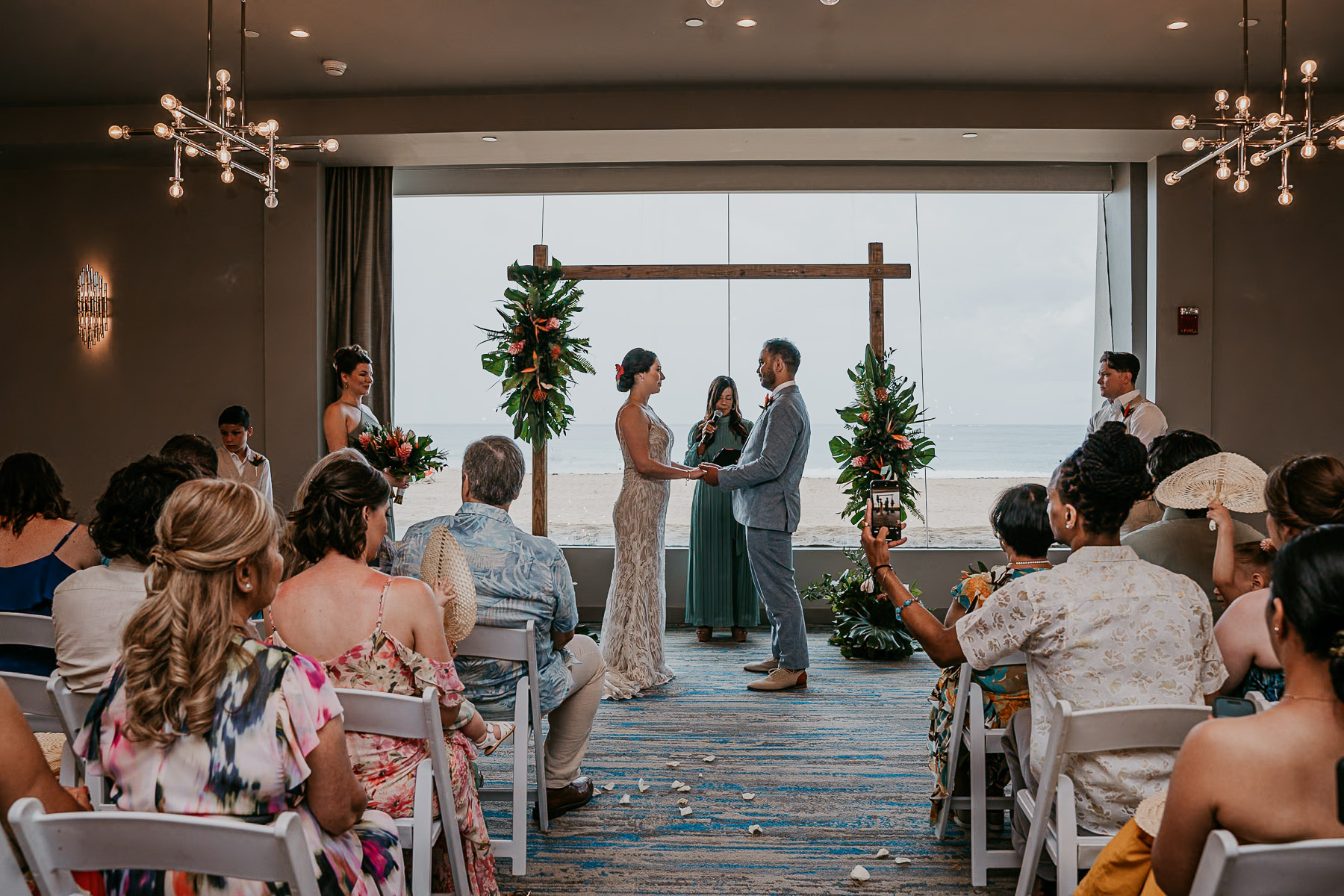 Indoor ceremony at La Concha Resort after a tropical rain shower.