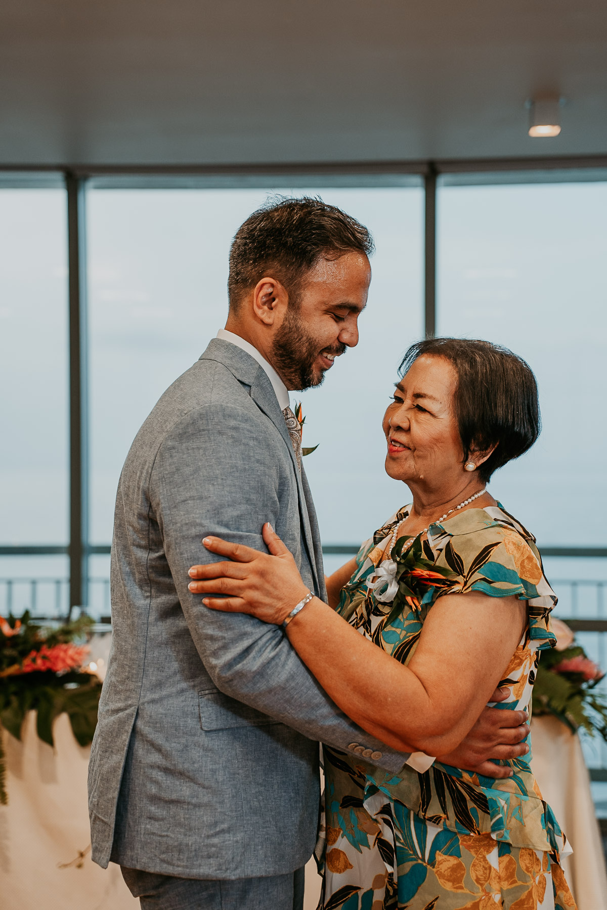 First dance with mom under glowing uplights in Salón Mirador at La Concha.