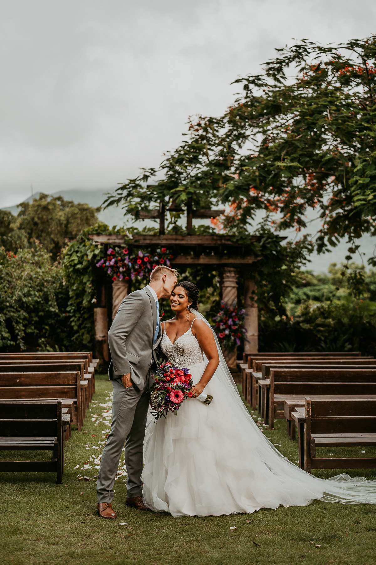 Couple at Hacienda Siesta Alegre Garden Captured by Puerto Rico Wedding Photographer Nilka Gissell.