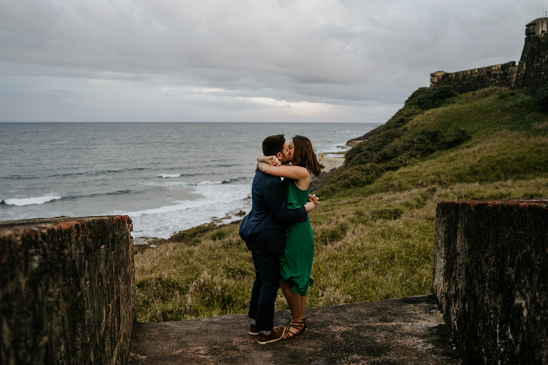 Happy couple engaged at Old San Juan during their couples session.