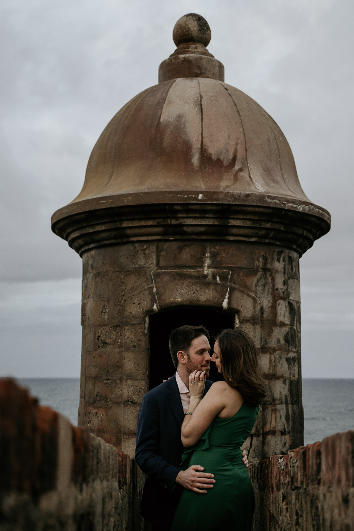 Recently engaged couple joyfully captured after their surprise proposal.