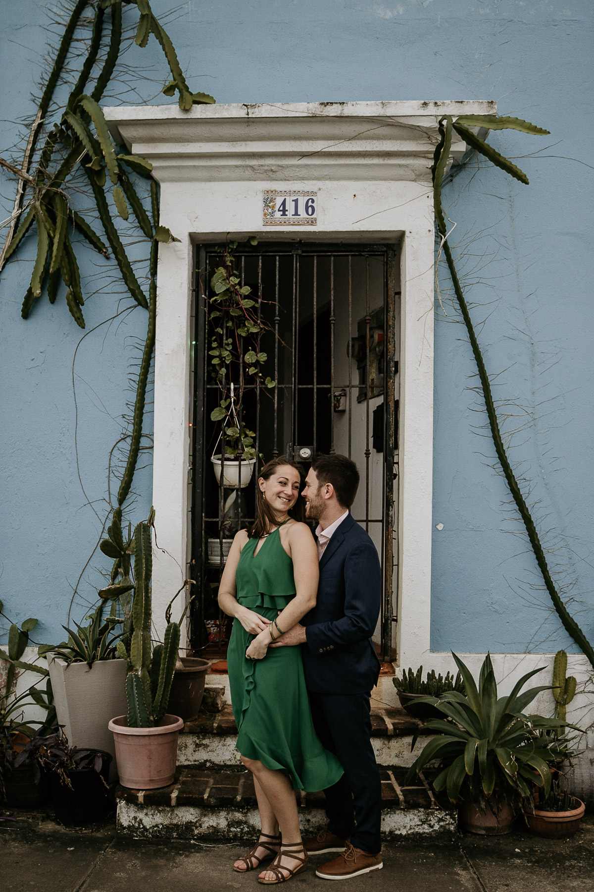 Couple with Old San Juan budlings during their couples session.