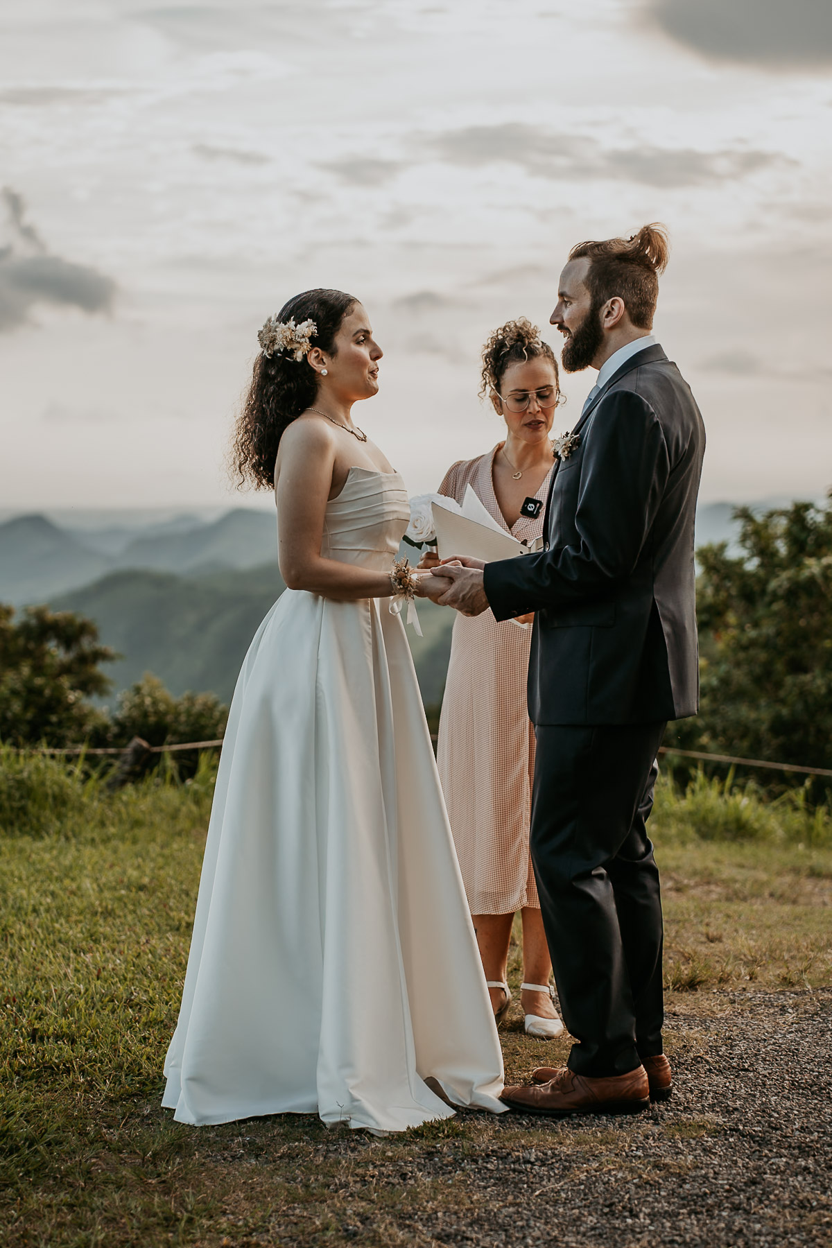 Elopement ceremony in Cayey, Puerto Rico, featuring a simple setup with breathtaking mountain views in the background.