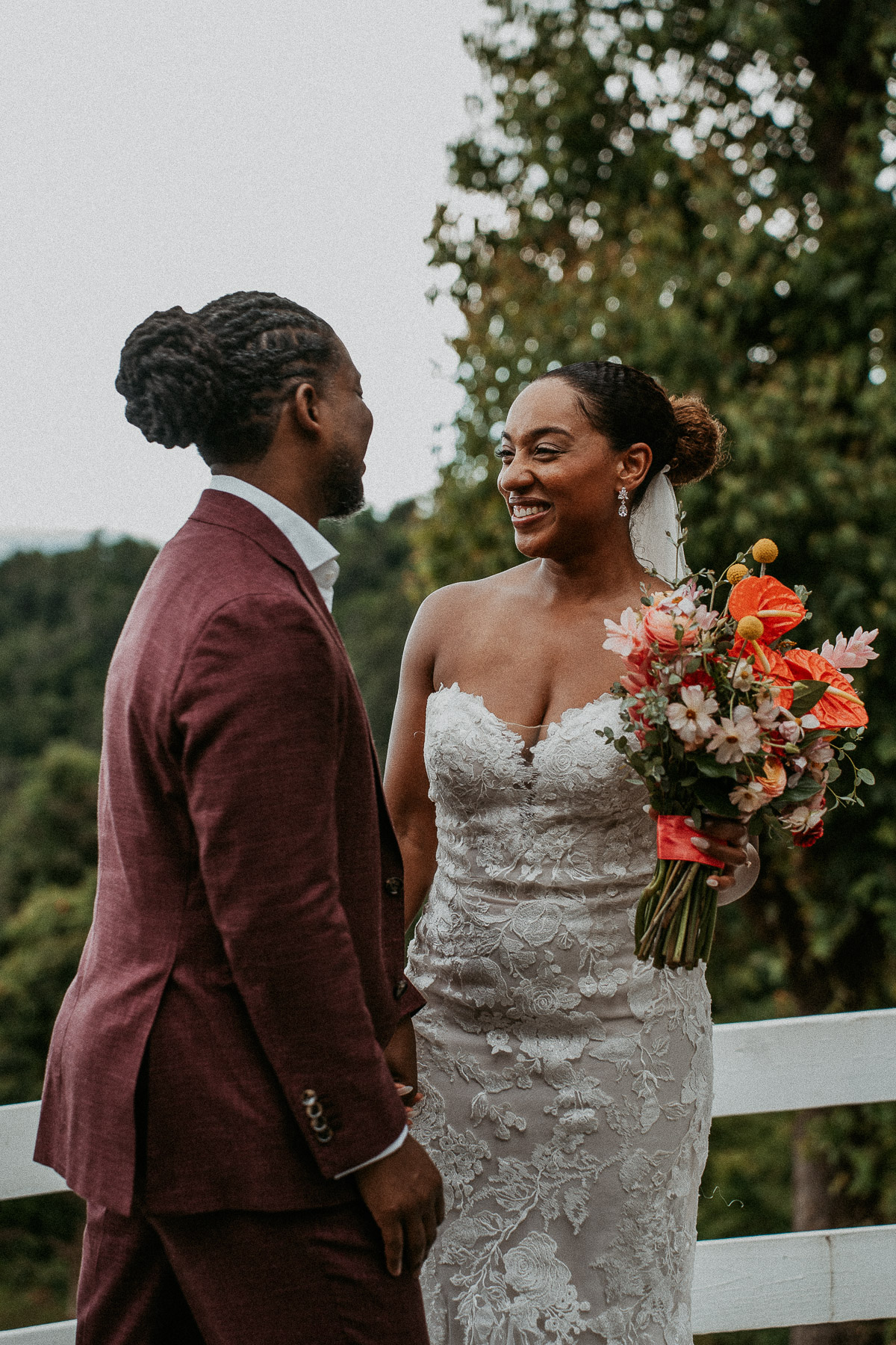 Candid moment during first look at a Puerto Rico Mountain Micro Wedding