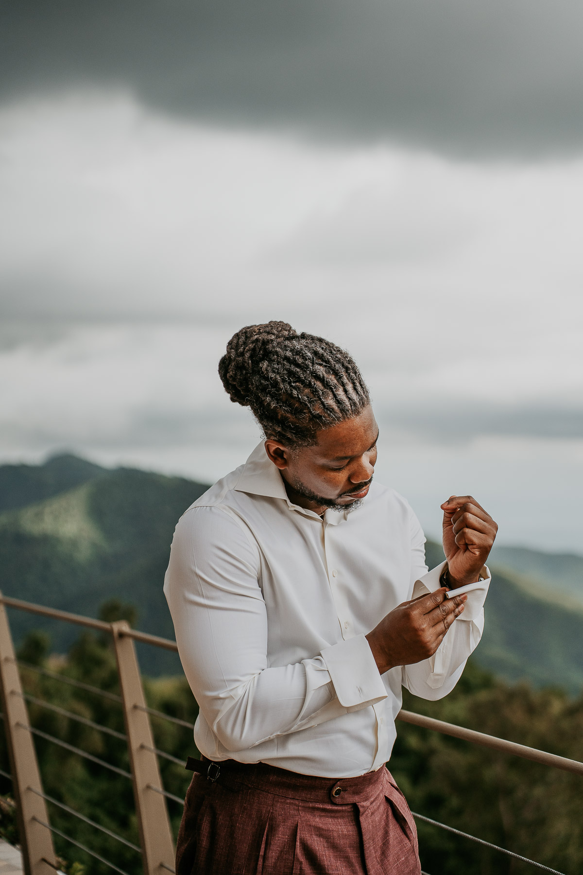 Groom getting ready during a Puerto Rico Mountain Micro Wedding