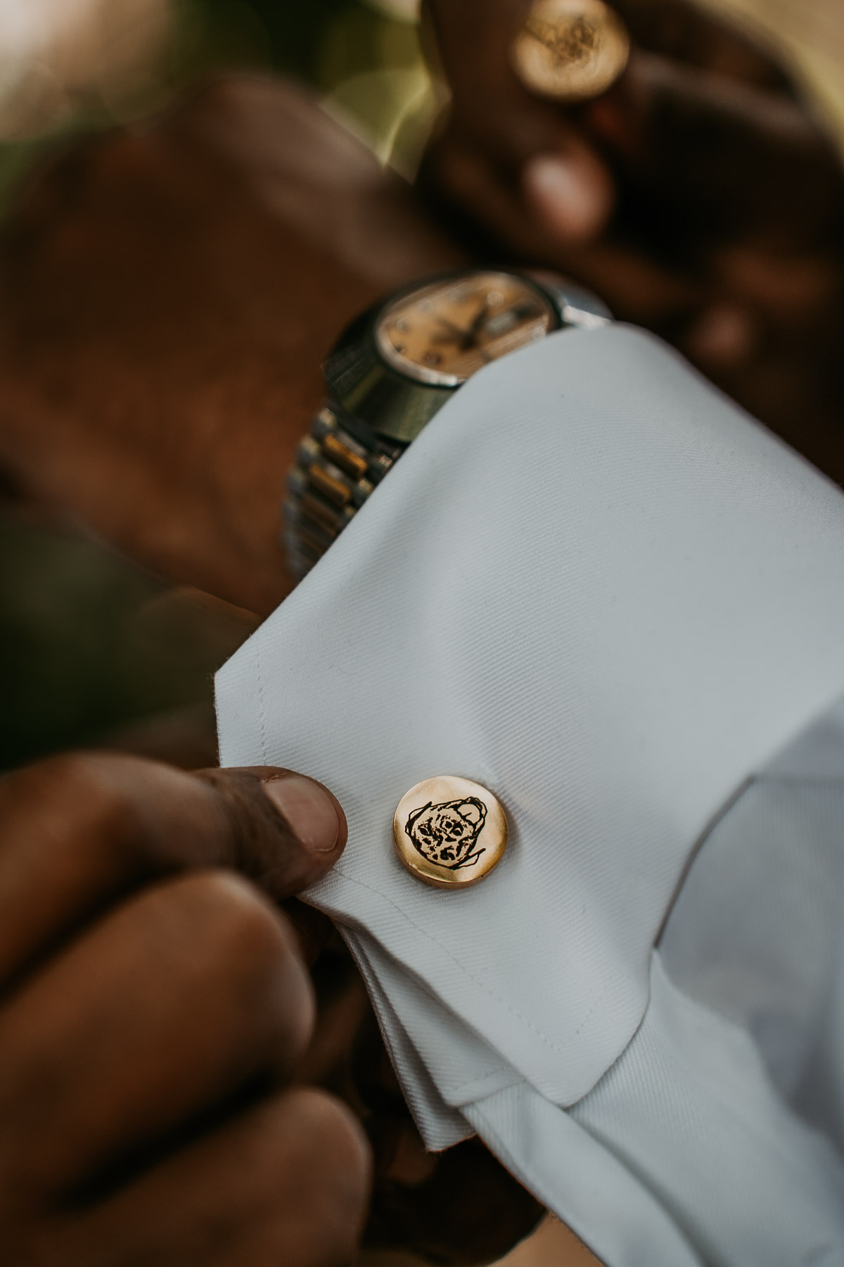 Dog cufflinks for groom.