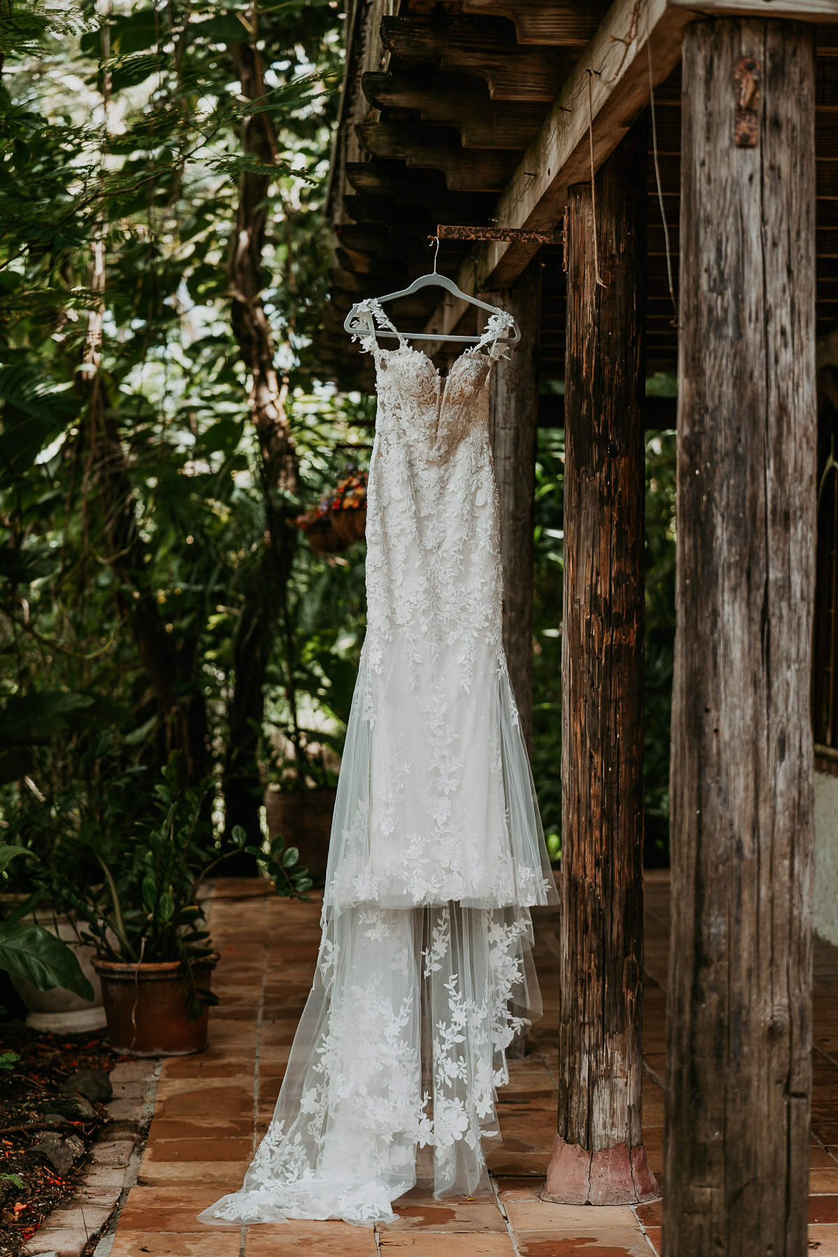 Bride dress hung at Flamboyan Room at Hacienda Siesta Alegre