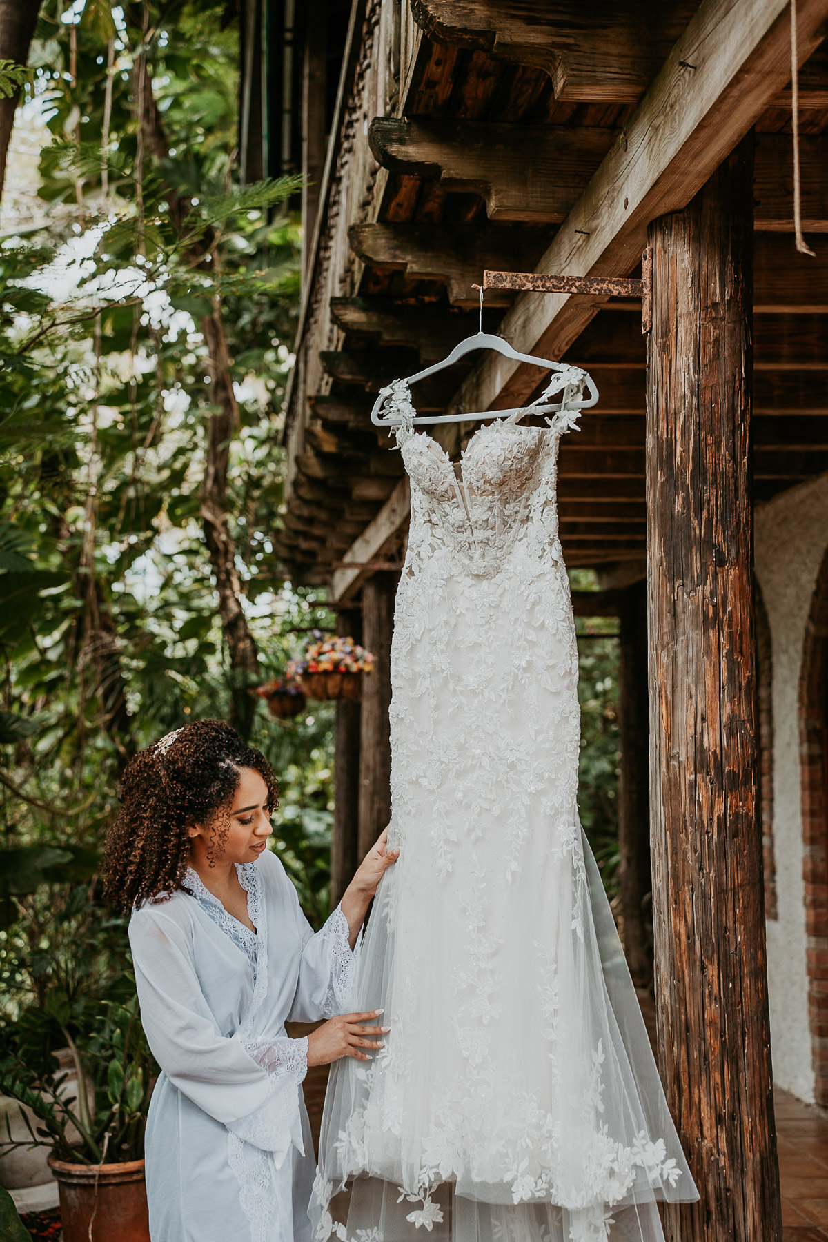 Bride looking at her dress.