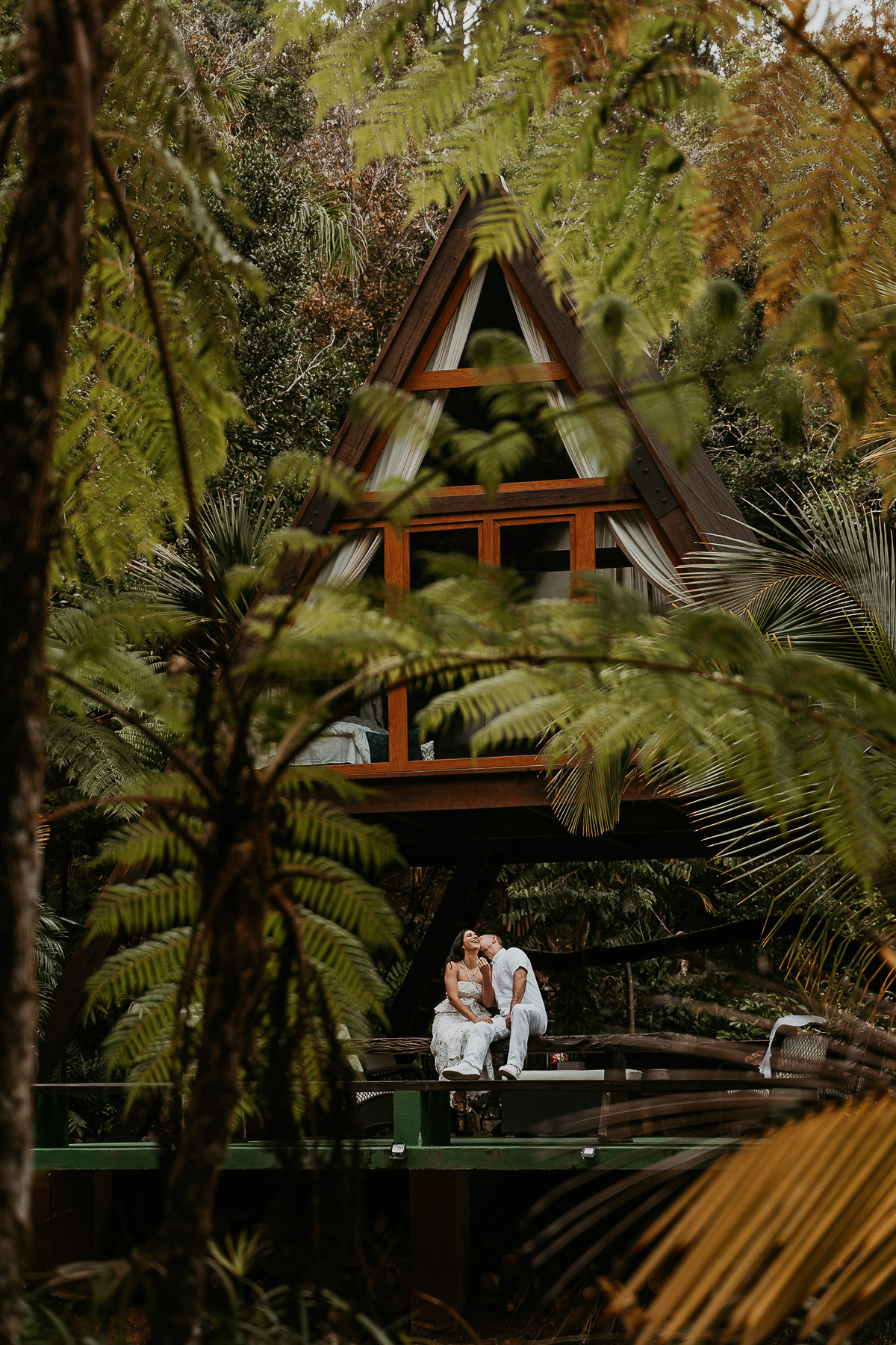 Couple enjoying their Puerto Rico Couple session at their A Frame Cabin in Mont Carpe Diem.