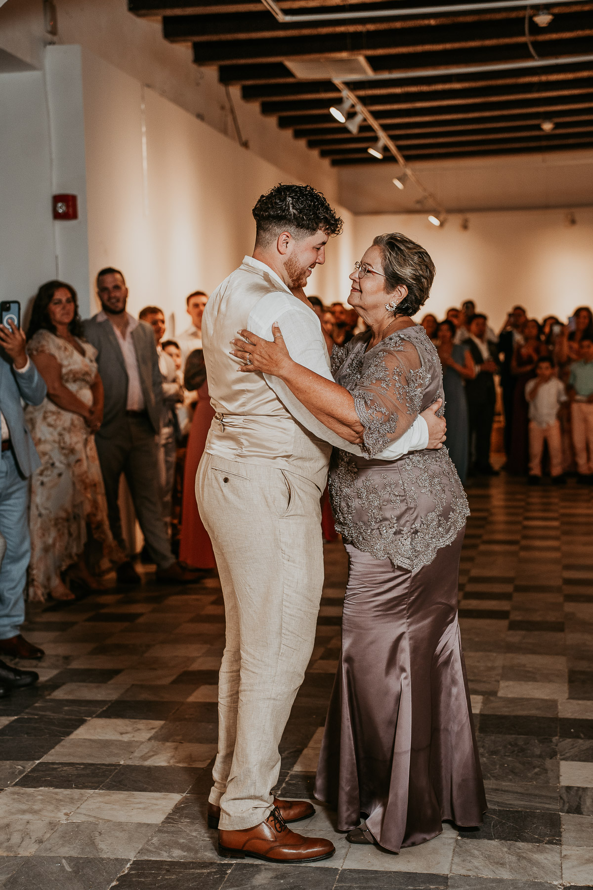 Groom dancing with mom