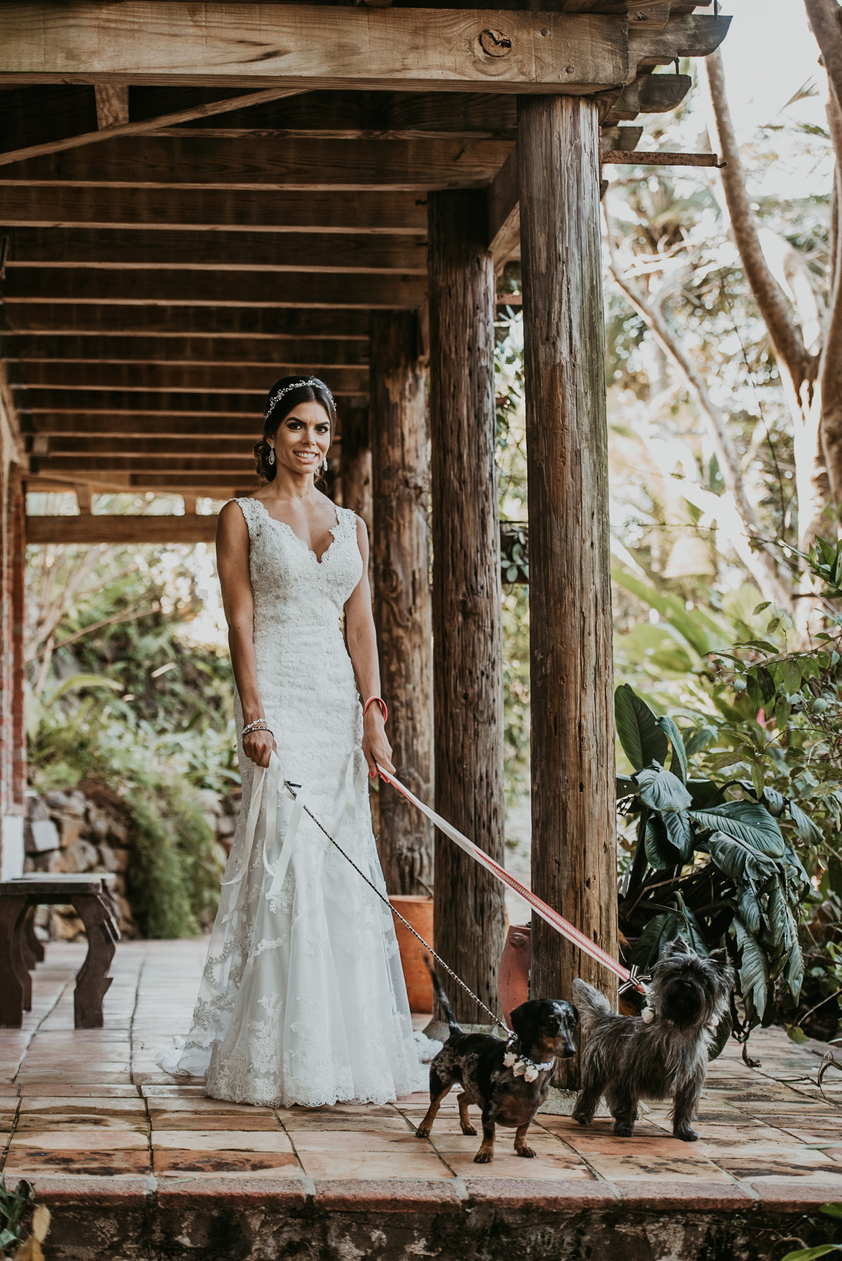 Bride with her dogs during her wedding at Hacienda Siesta Alegre in Rio Grande Puerto Rico.