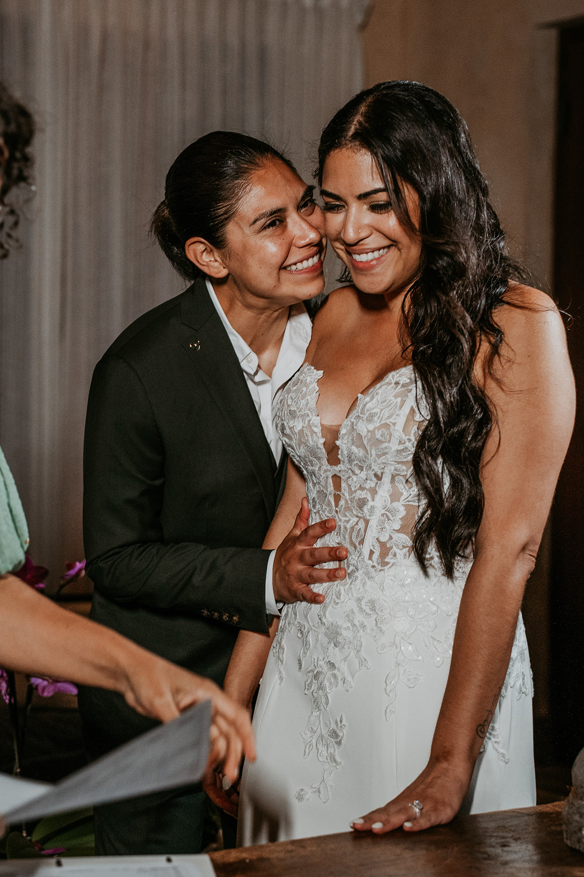 Two brides before signing marriage license,
