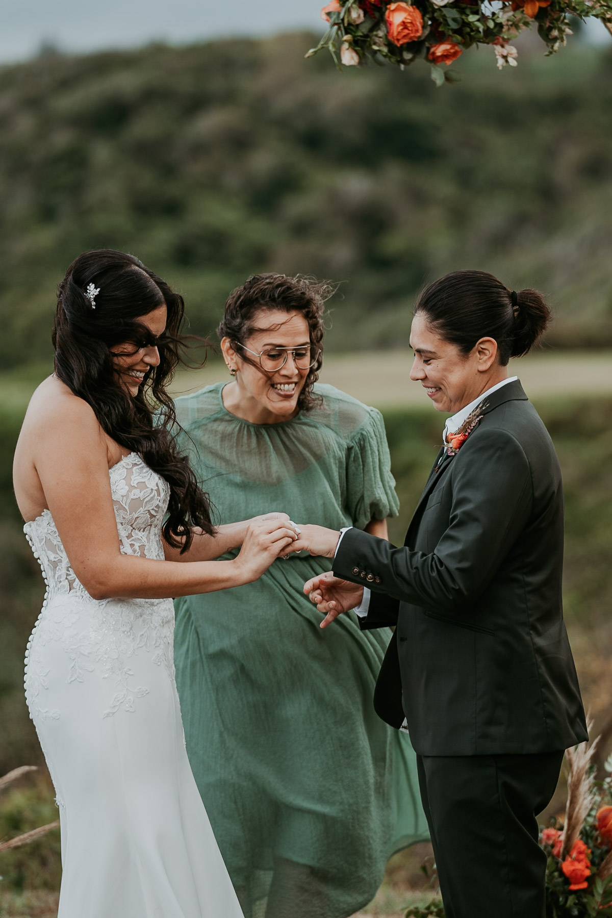LGBTQ+ wedding ceremony at Royal Isabela golf course with dramatic ocean views in Puerto Rico.