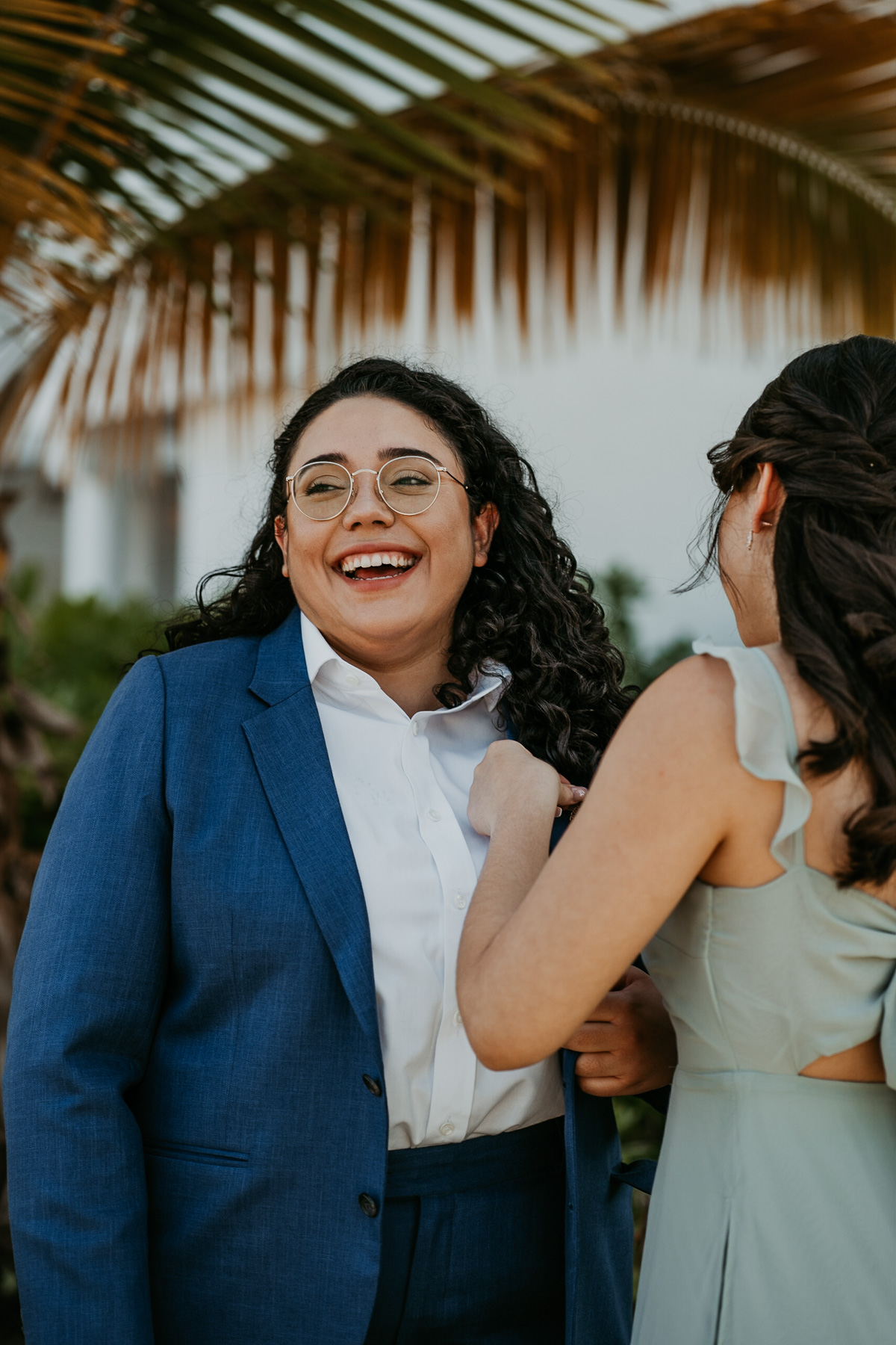 Bride with sister during getting ready.