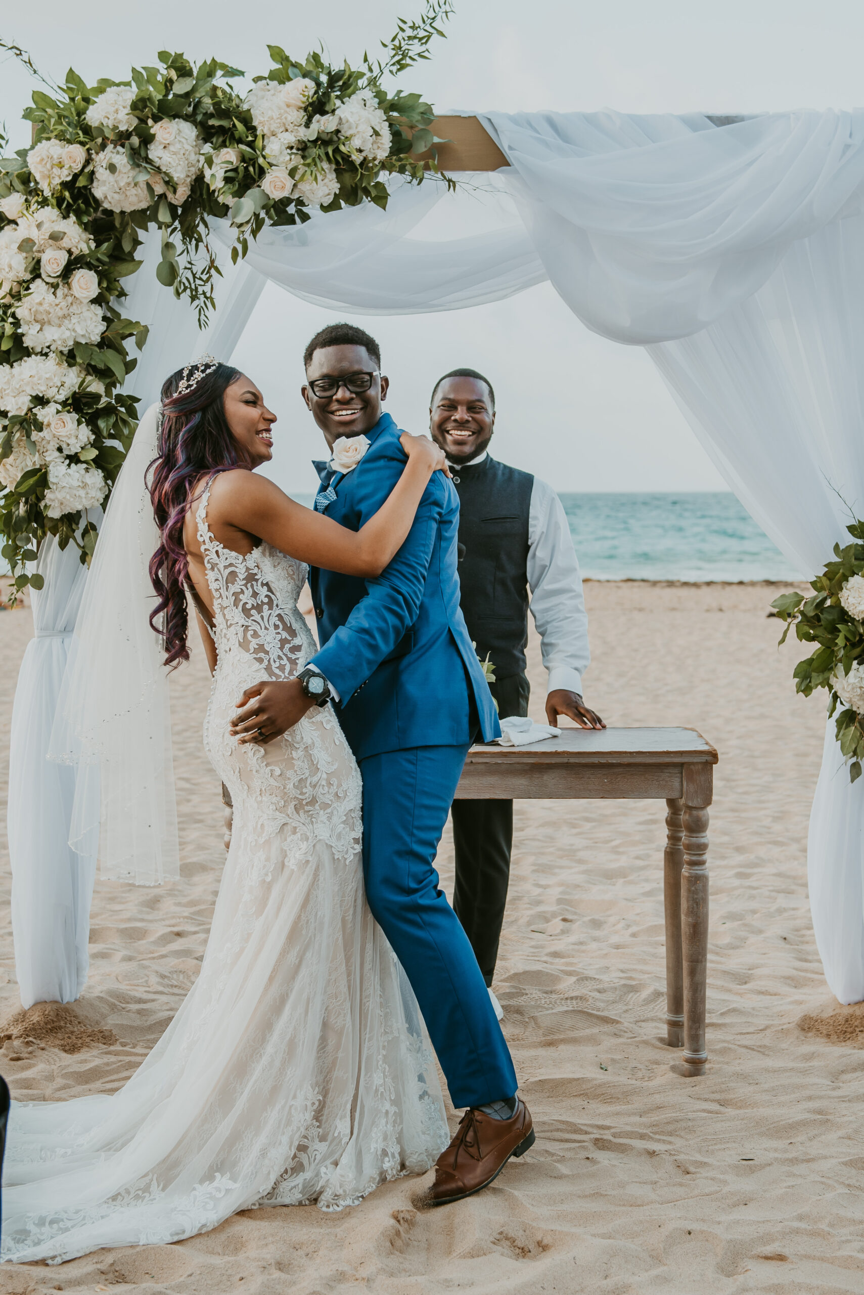 Romantic beach wedding ceremony at La Concha Resort, Puerto Rico, with ocean backdrop.