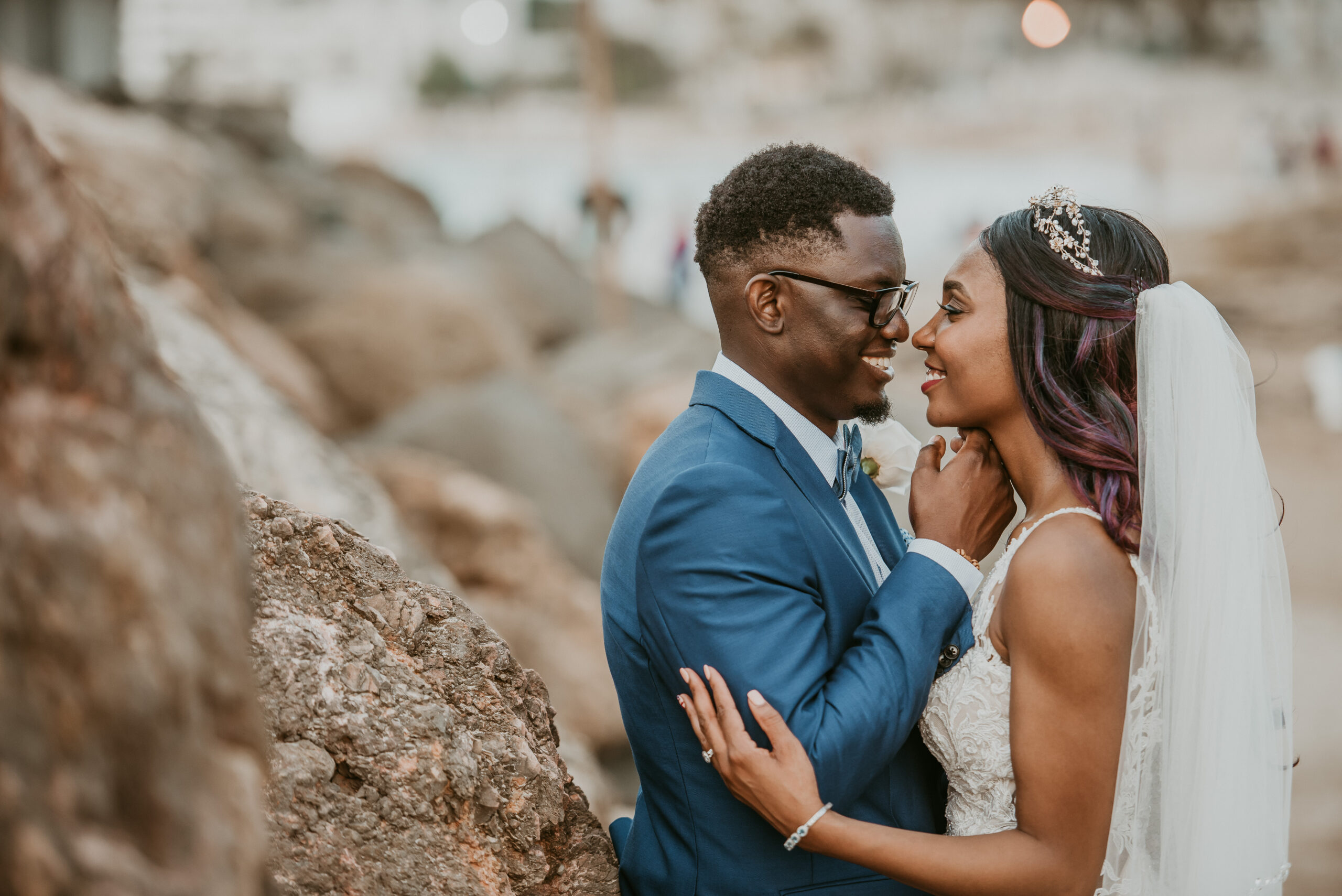 Romantic beach bride and groom portraits at La Concha Resort, Puerto Rico, with ocean backdrop.