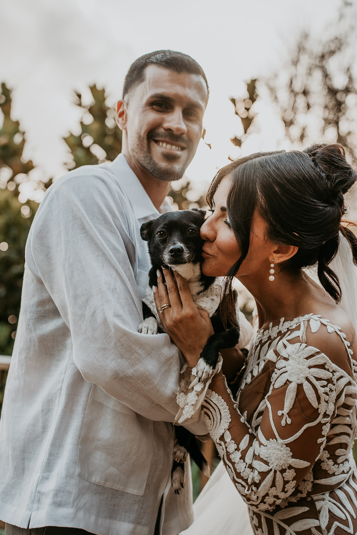 Couple wedding portrait photography capturing couple’s natural connection with their pet dog chihuahua