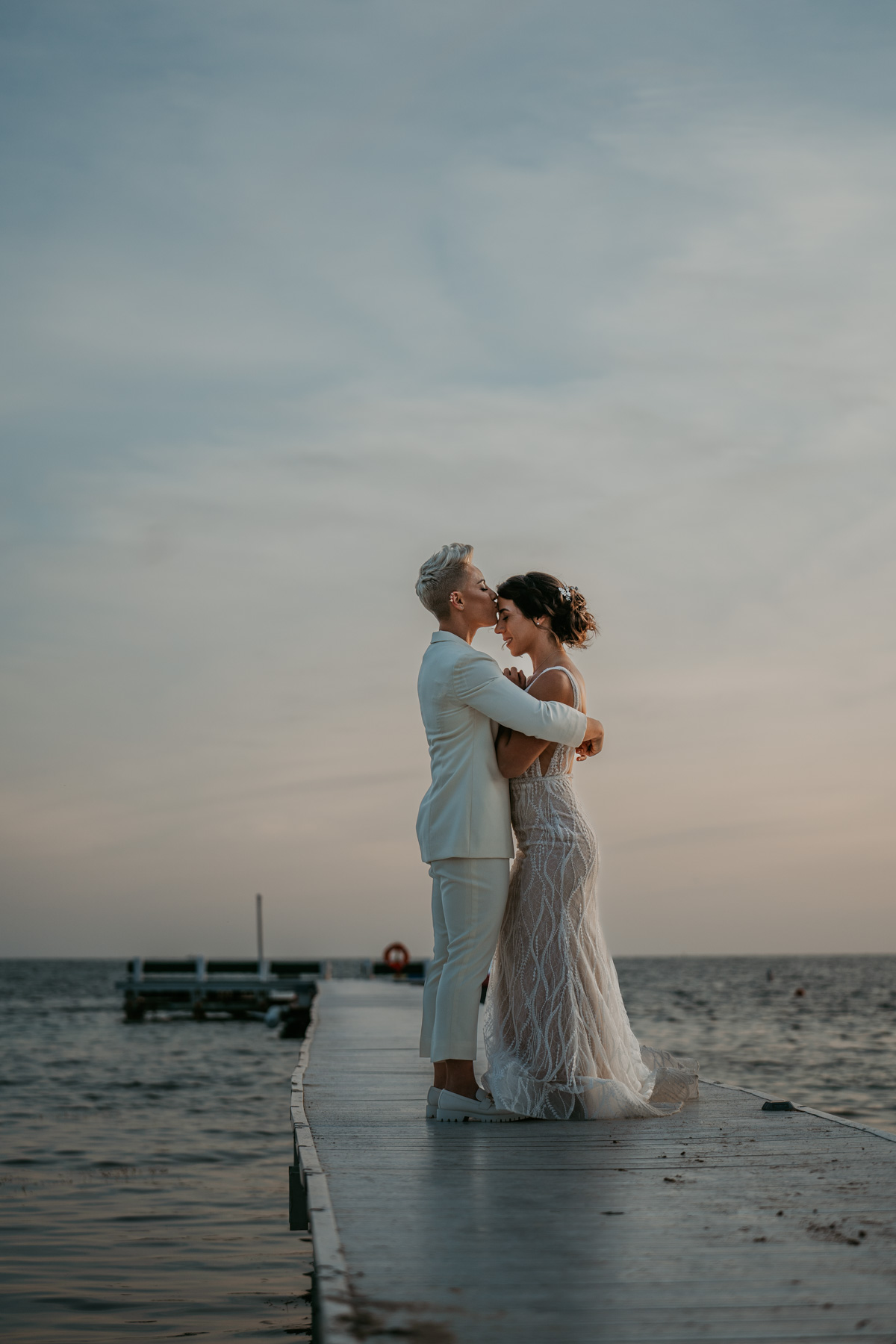 A Lesbian couple getting married at the beach in Copa Marina Beach Resort