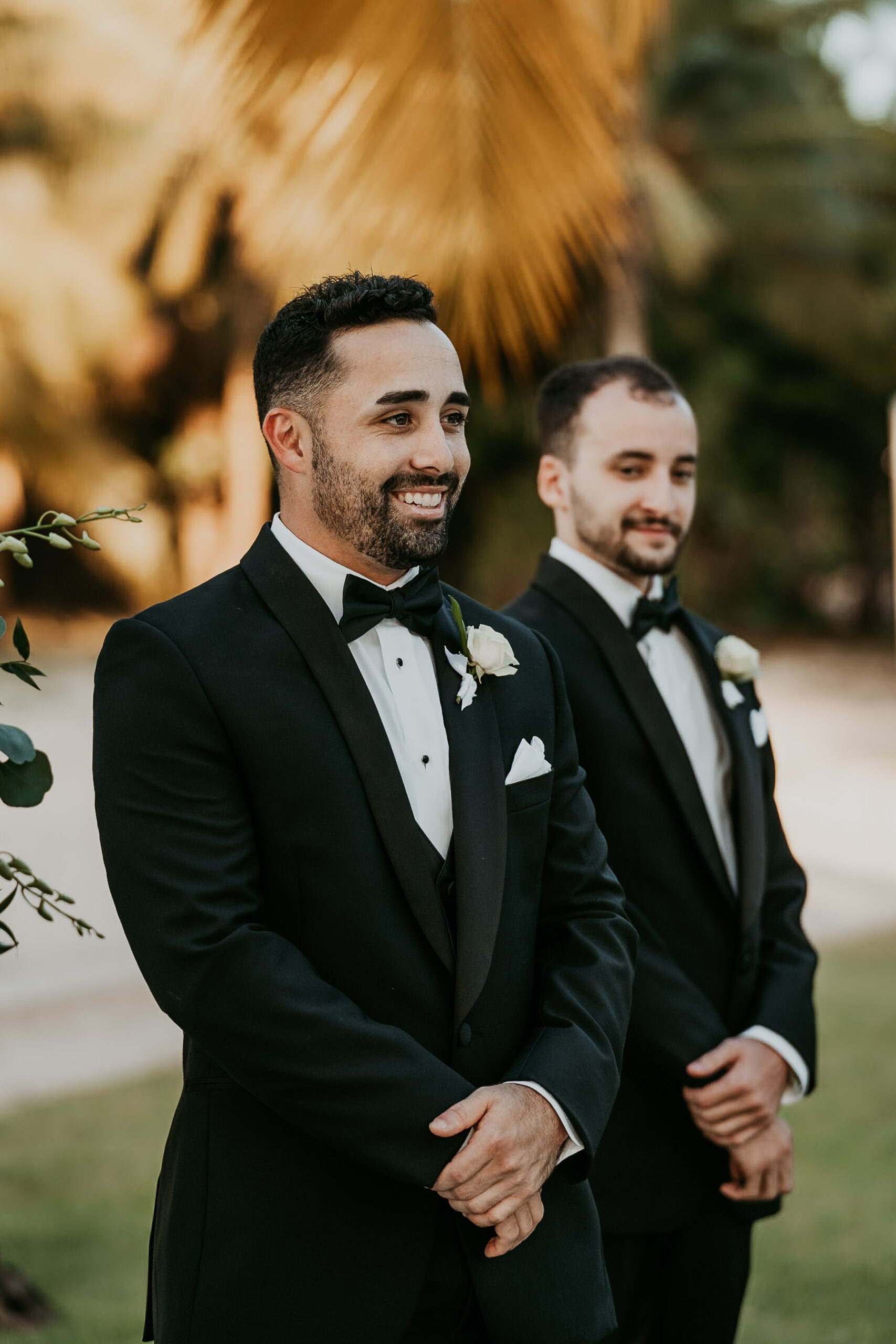 Groom smiling waiting for his bride at Courtyard Marriot wedding