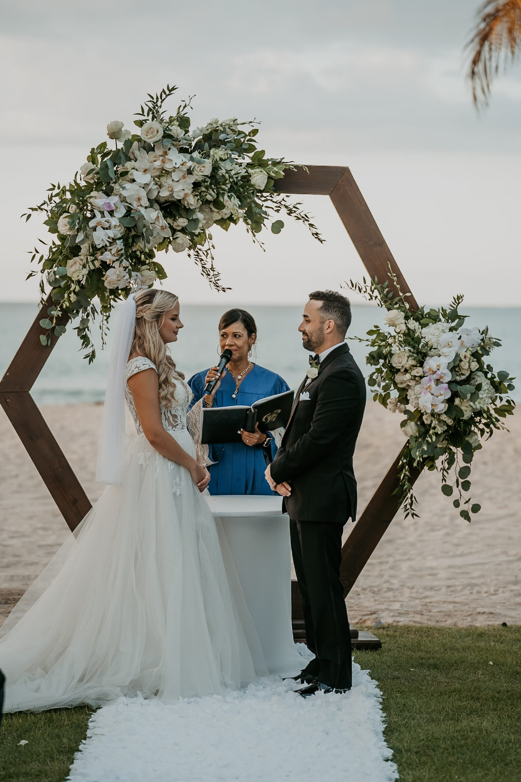 Bride and groom with ocean in the background at Courtyard Marriot wedding