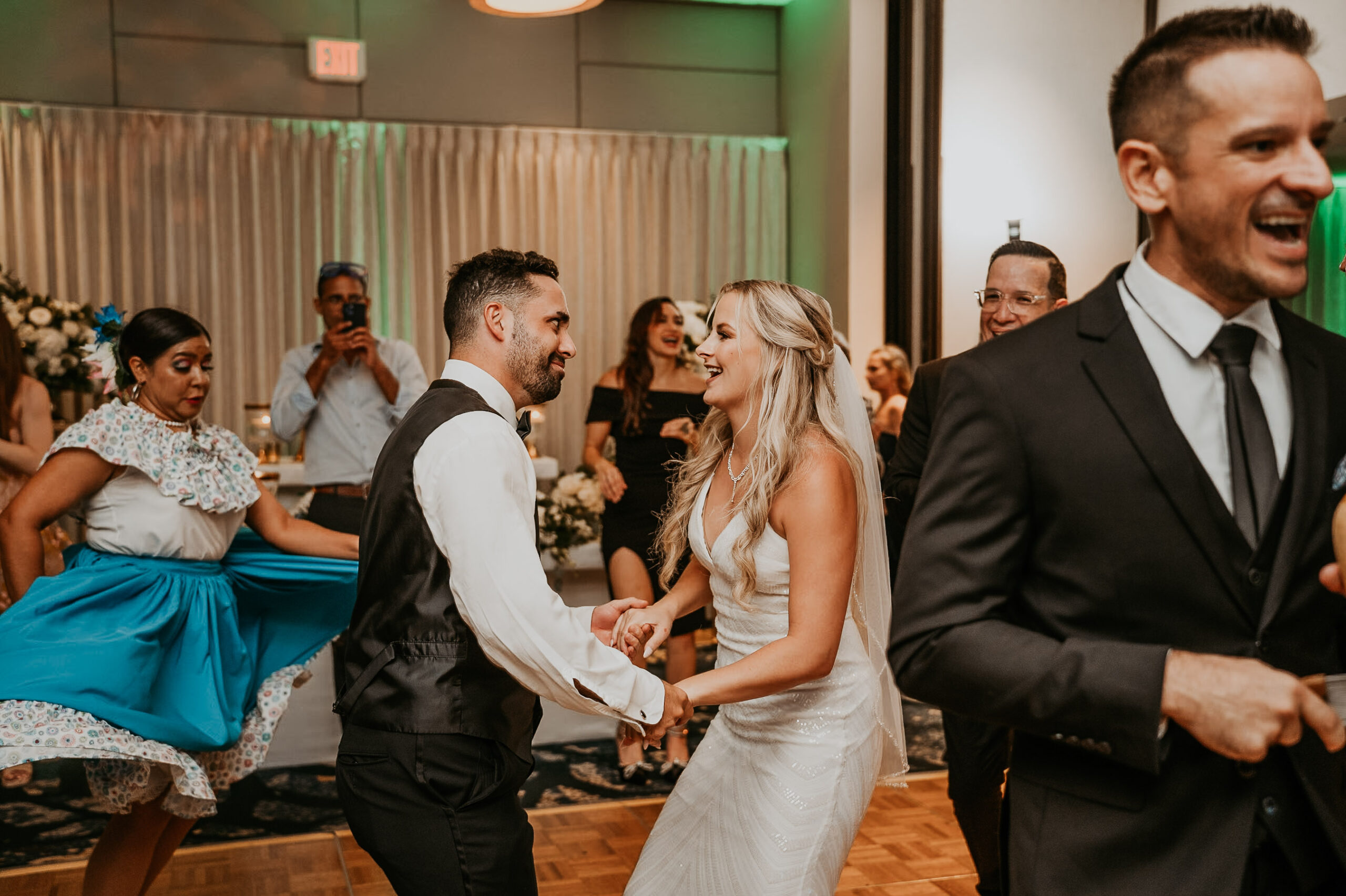 Energetic Pleneros performance as bride and groom join in dance at Courtyard Marriott Puerto Rico