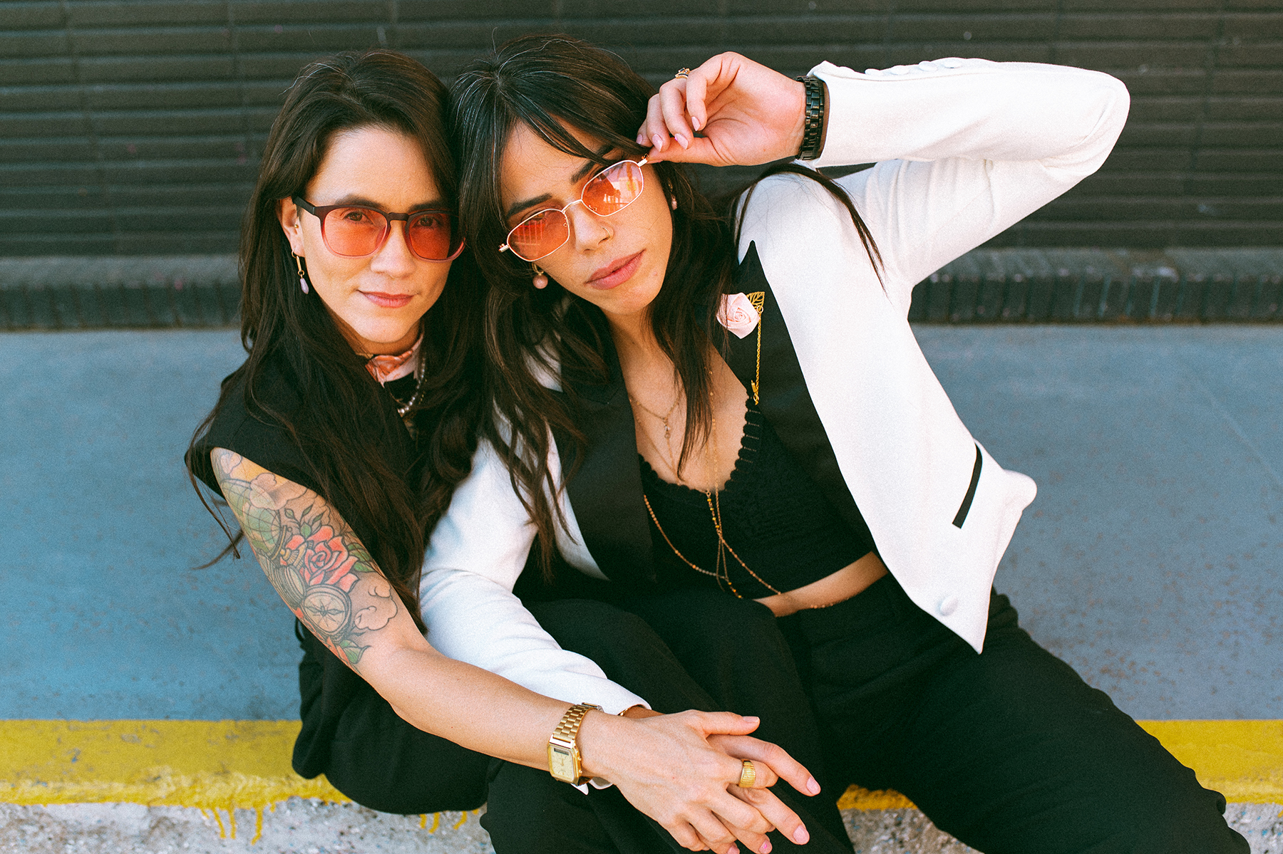 Nilka Gissell posing with wife on Las Vegas strip after elopement ceremony