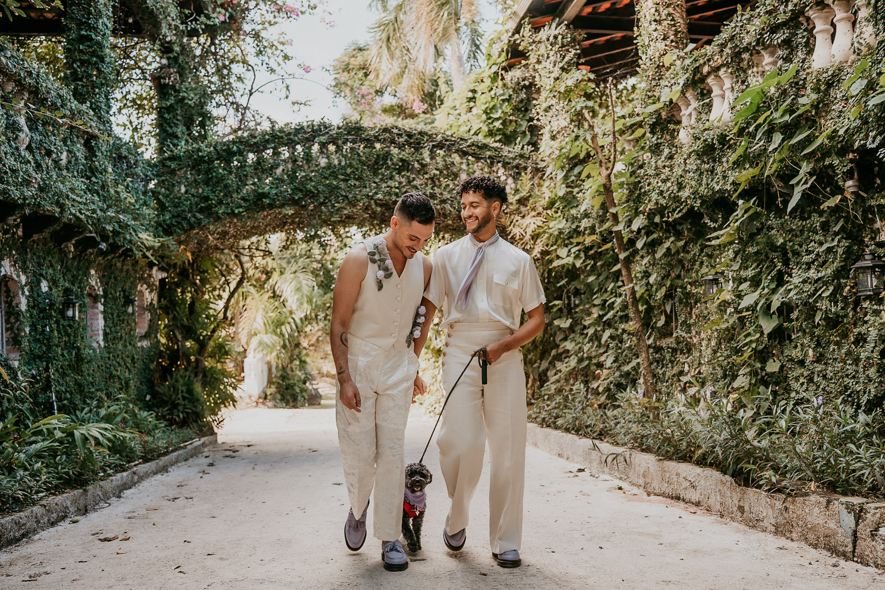 Emotional and playful portraits of a same-sex couple celebrating their wedding day together.
