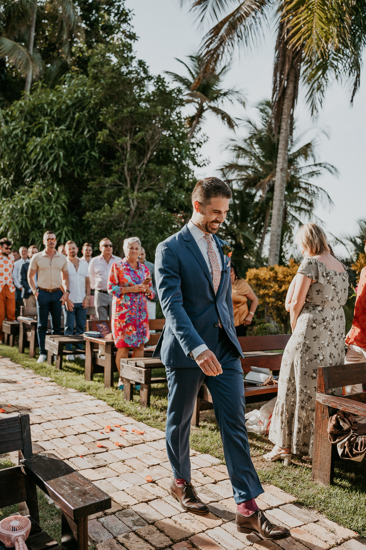 Groom walking down the Isle at Hacienda Siesta Alegre LGBTQ+ wedding